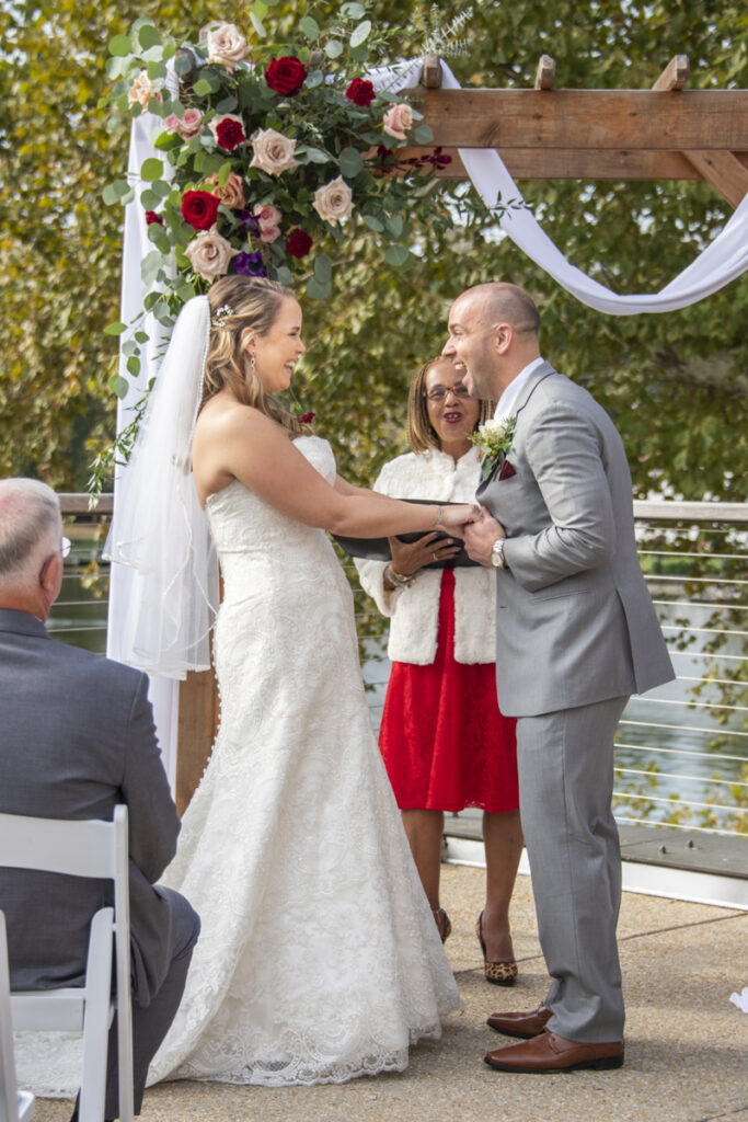 Couple excited after wedding ceremony at The Riverview at Occoquan in Lorton, VA.