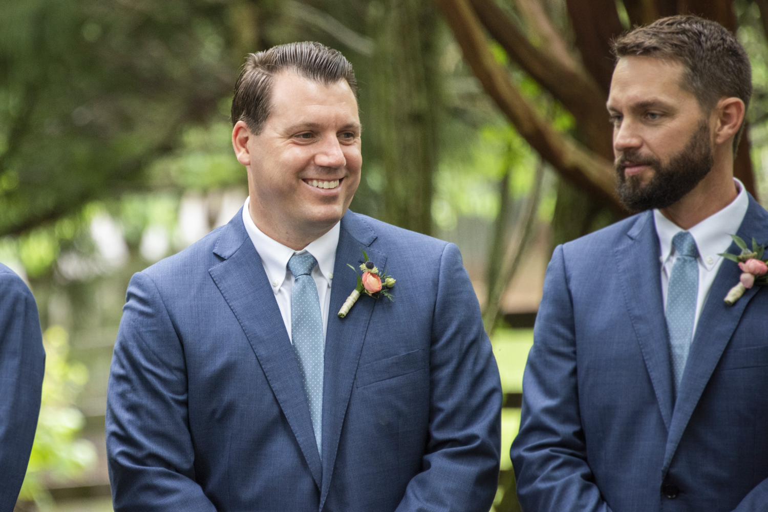 Best man smiling during wedding ceremony