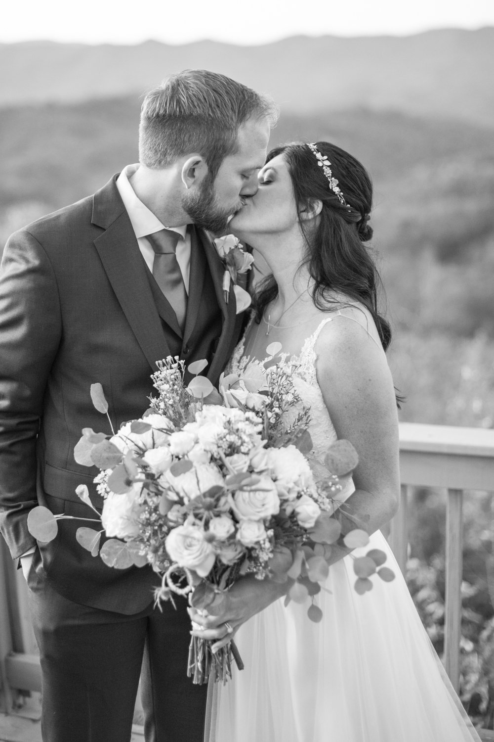 Couple kissing at Hawkesdene Fall Wedding Photography