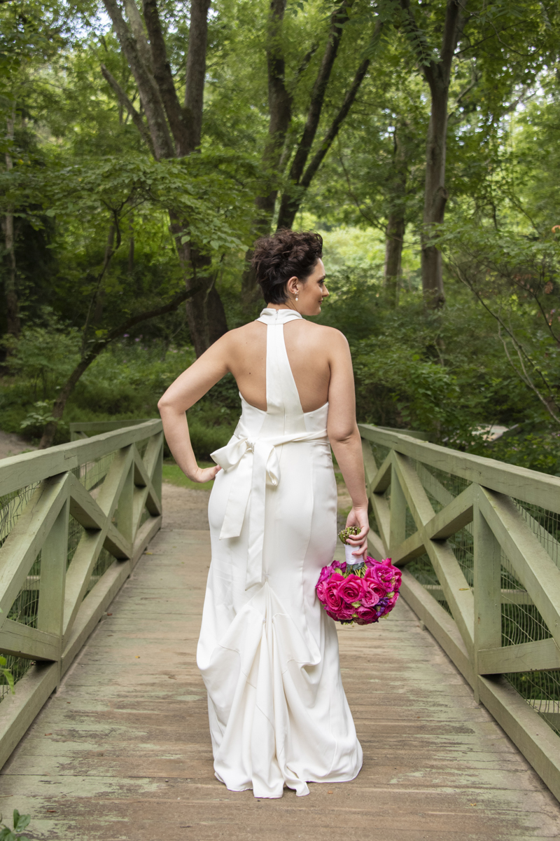Modern bridal portrait of back of dress at Asheville Botanical Gardens elopement