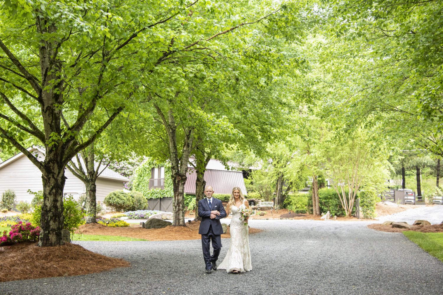 Bride and father walking down aisle