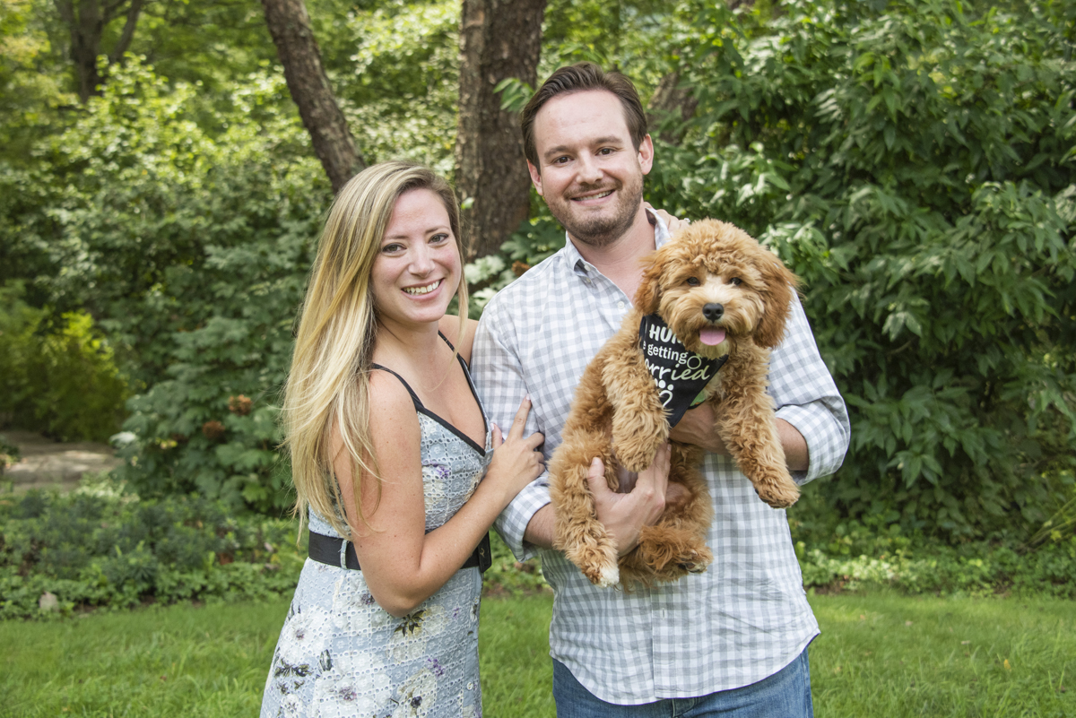 Couple with dog after engagement