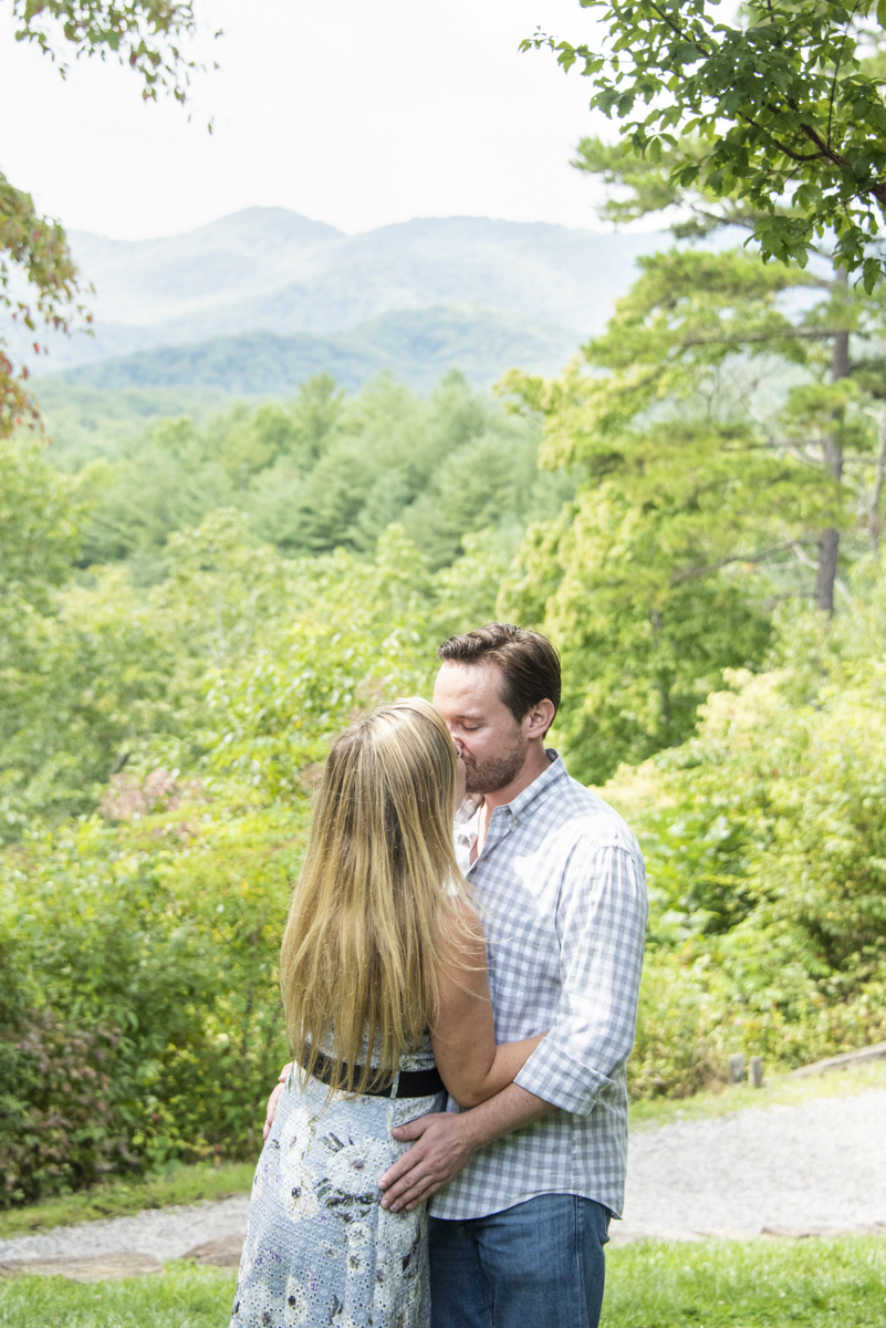 Couple kissing at The North Carolina Arboretum Engagement Photography