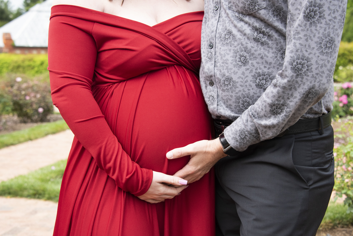 Couple with baby bump in Asheville