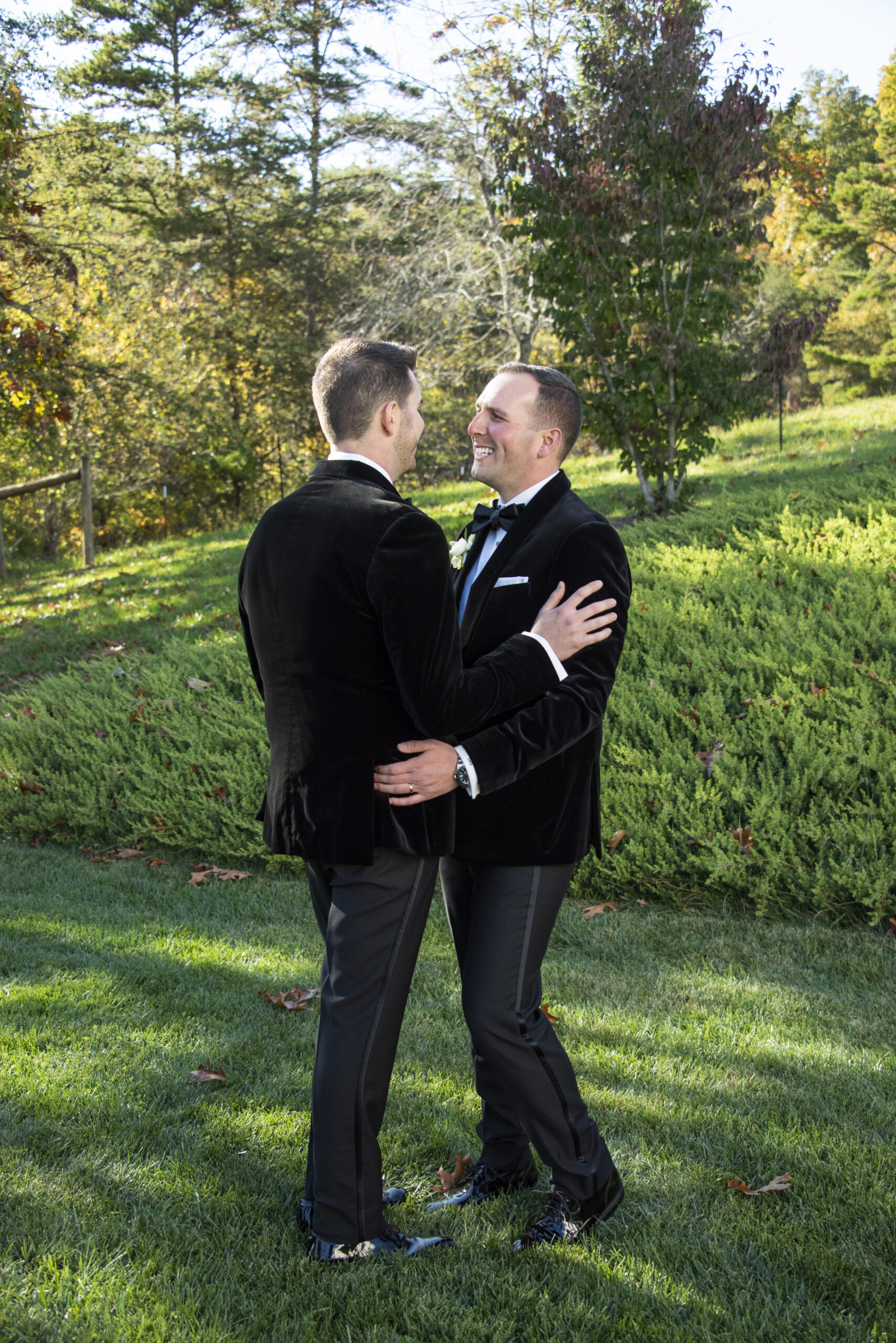 Couple smiling at each other at Chestnut Ridge Wedding Photography in Asheville, NC