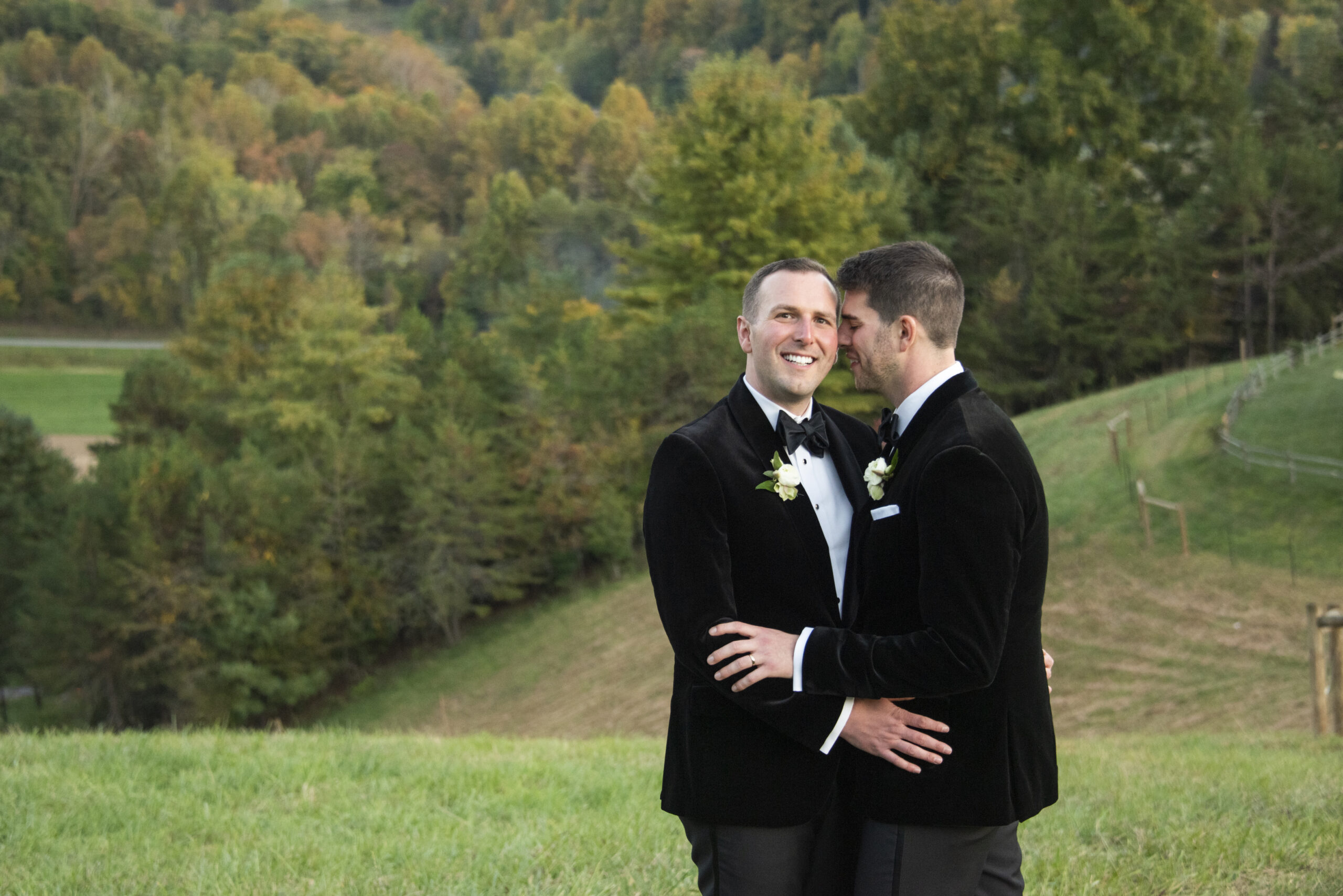 Couple nuzzling at Chestnut Ridge Wedding Photography in Asheville, NC