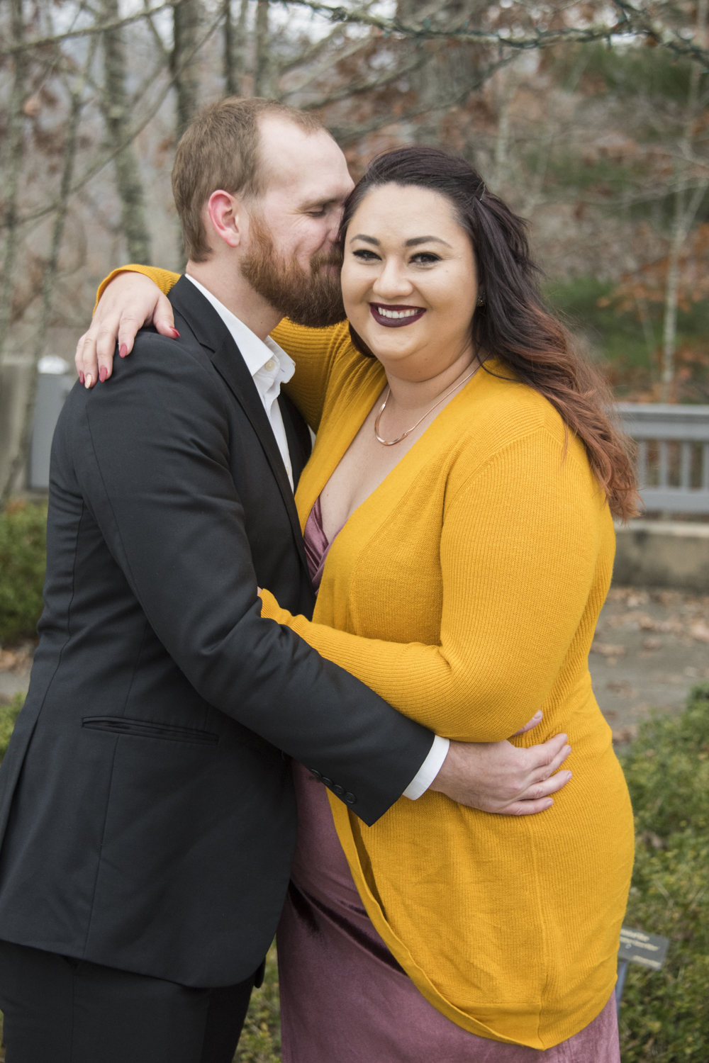 Couple smiling at Engagement Photo Locations in Asheville