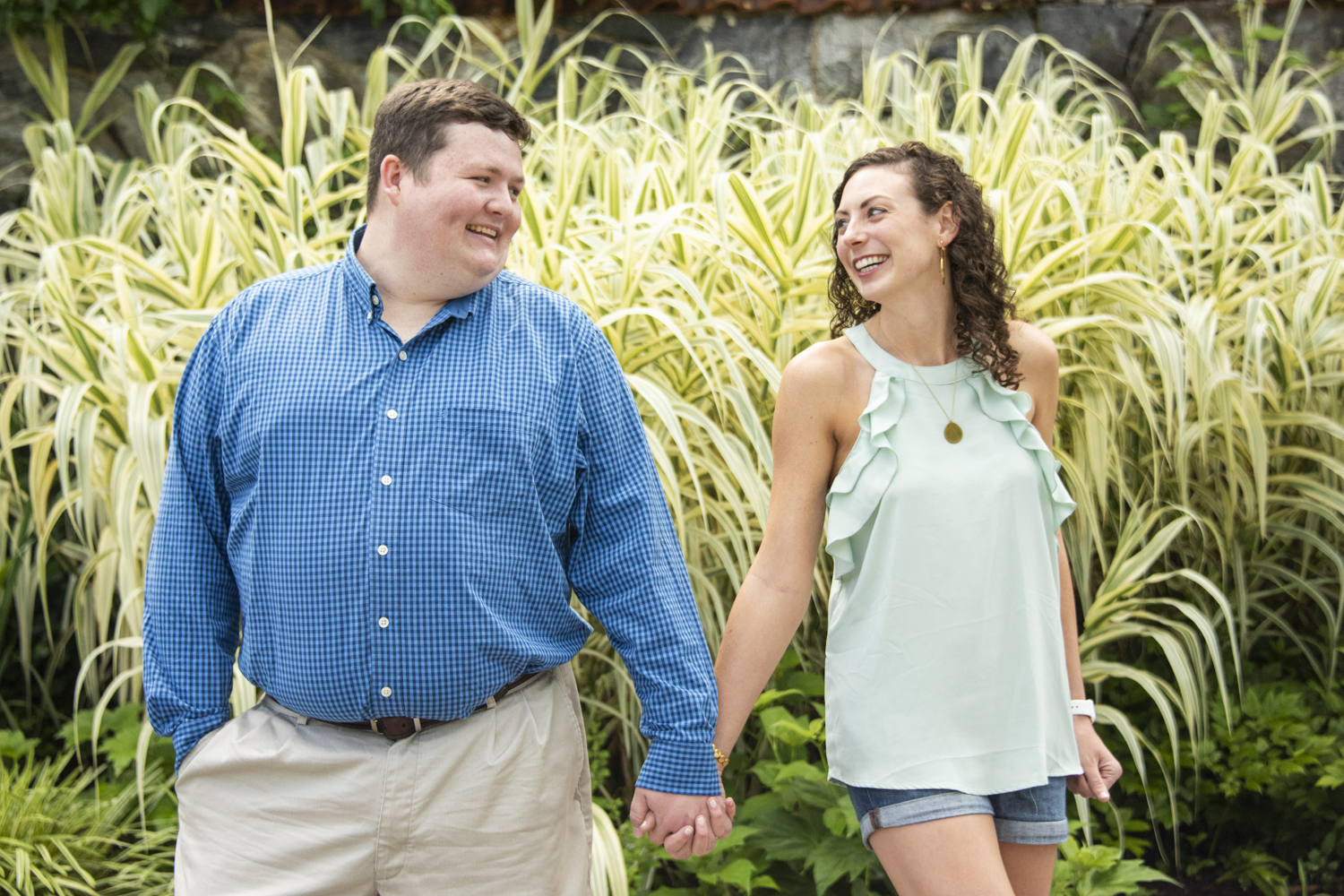 Couple holding hands at Biltmore Estate