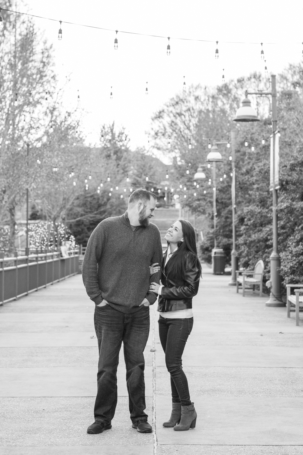 Engagement Photo Locations in Asheville The NC Arboretum couple looking at each other