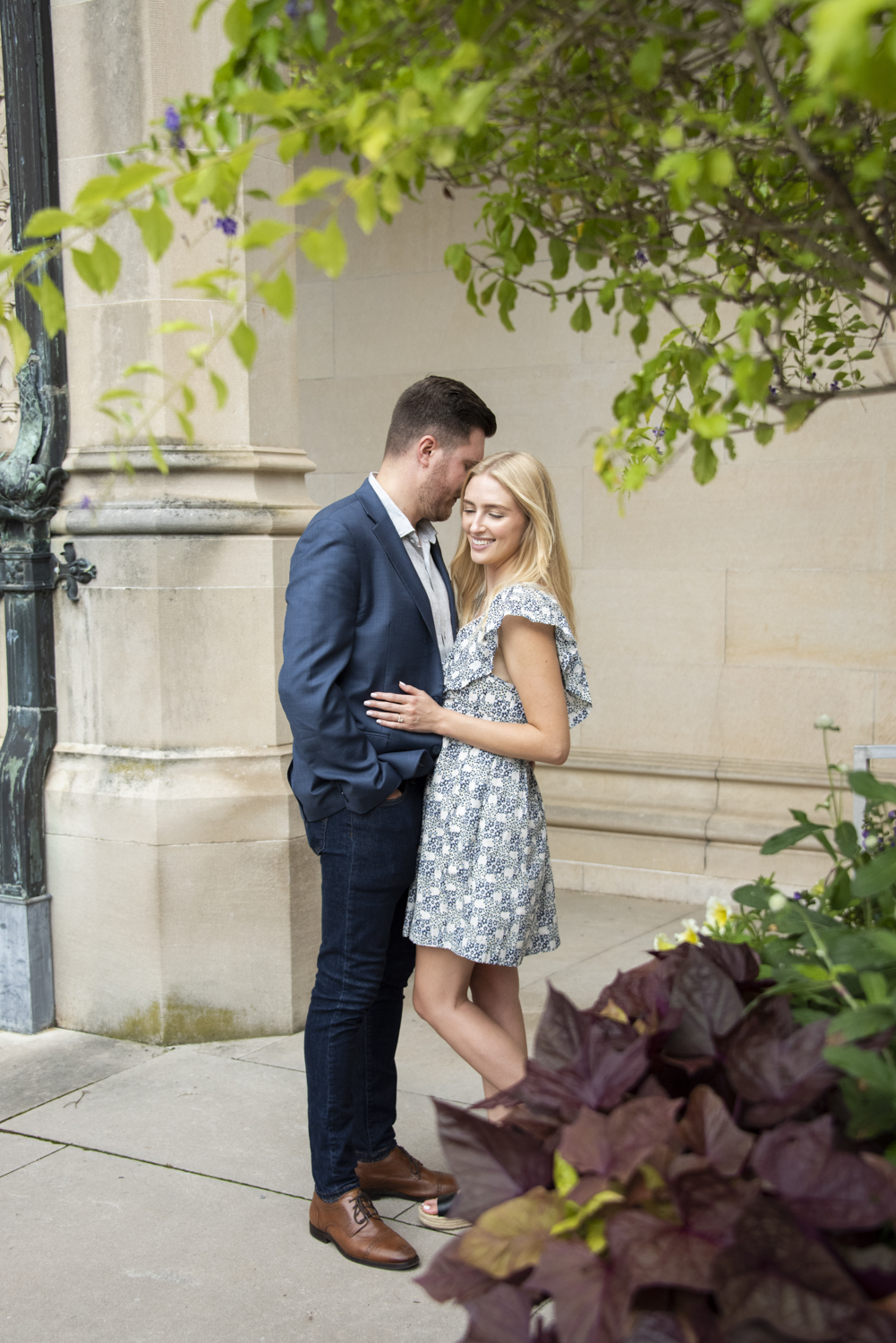 Biltmore Estate Proposal Photography with couple snuggling