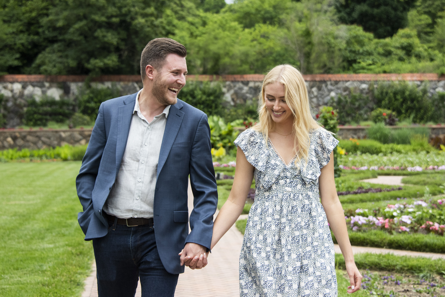 Couple walking in walled garden at Biltmore Estate Proposal Photography