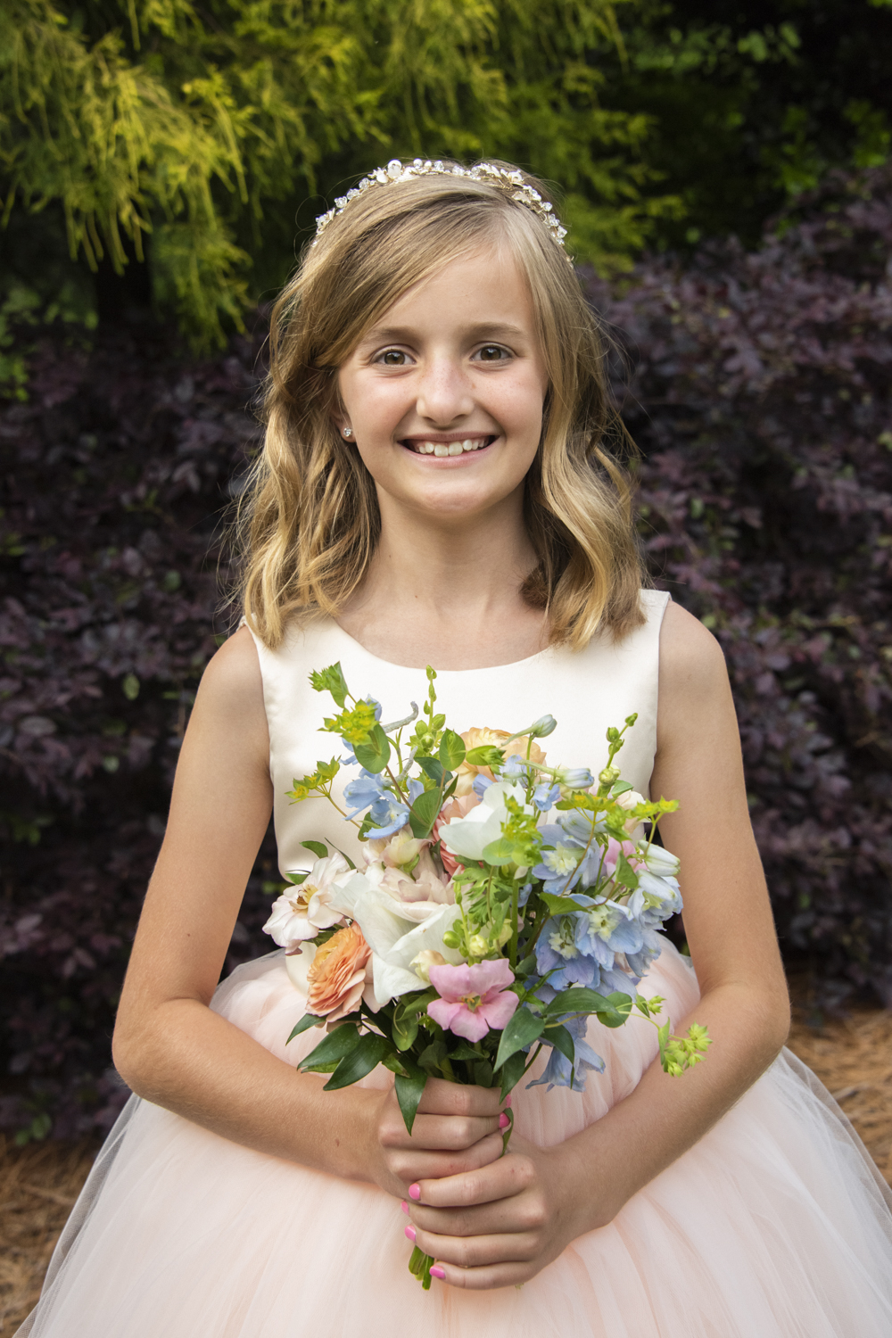 Flower girl with bouquet