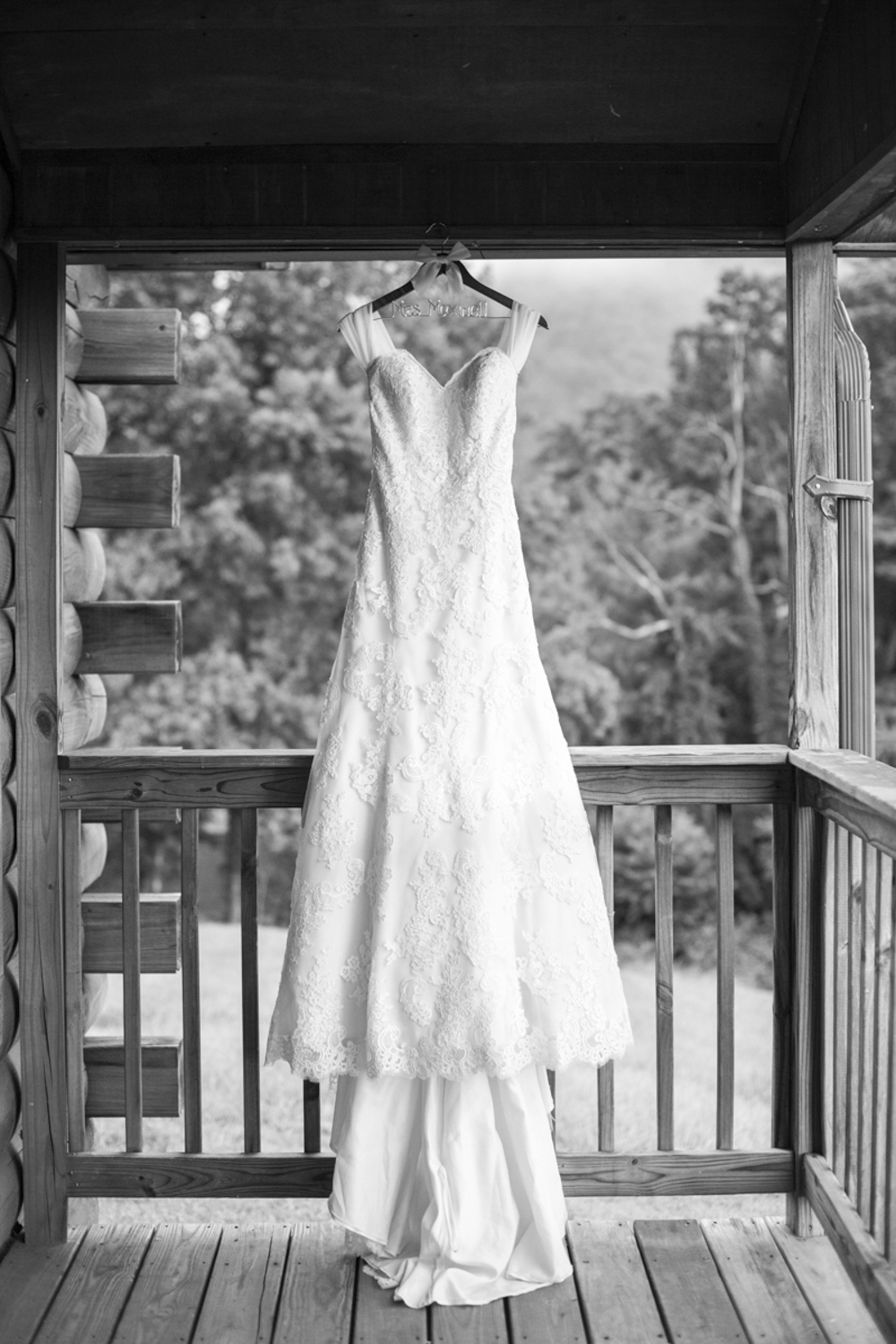Hanging wedding dress at Engadine Inn Wedding Photography