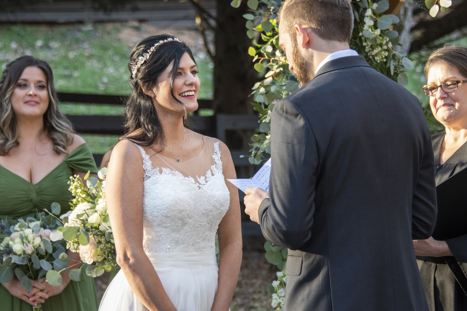 Bride smiling during wedding ceremony