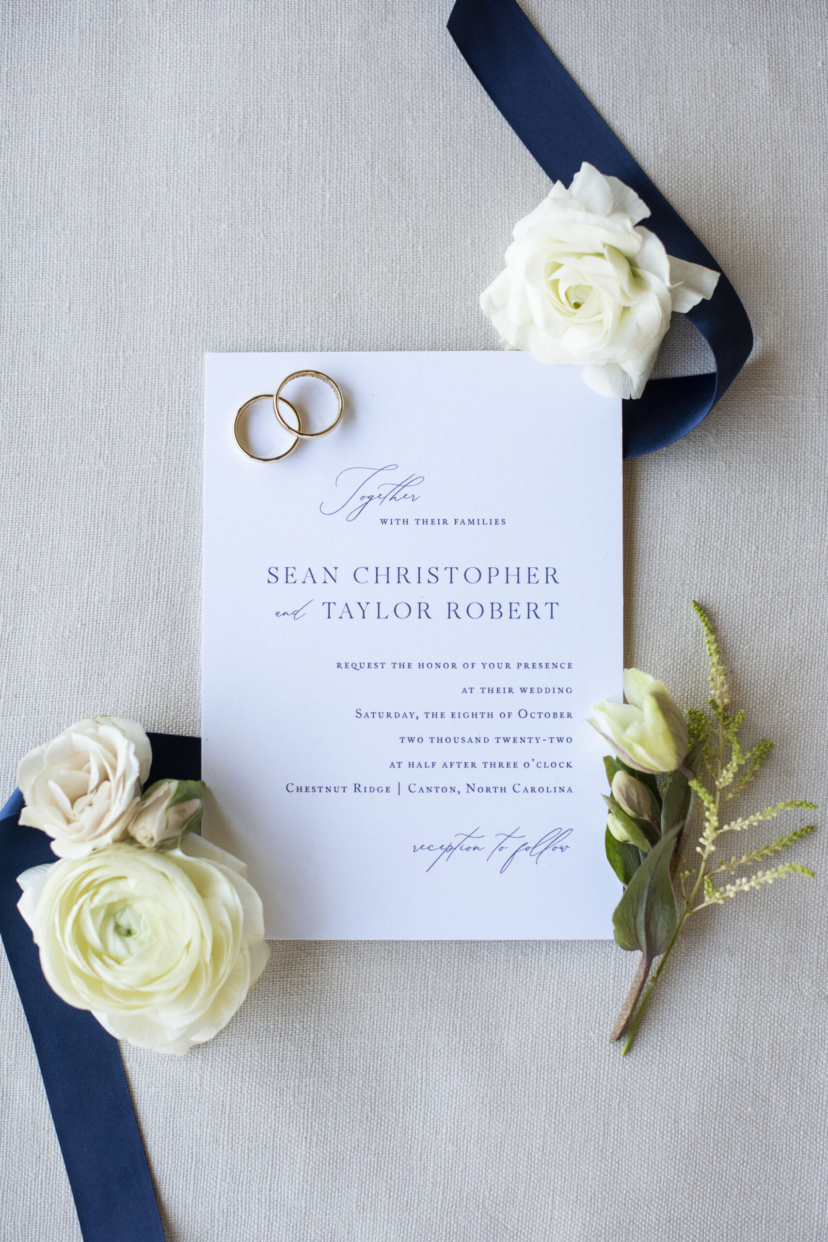 Minted invitation, rings, and flowers at Chestnut Ridge Wedding Photography in Asheville, NC