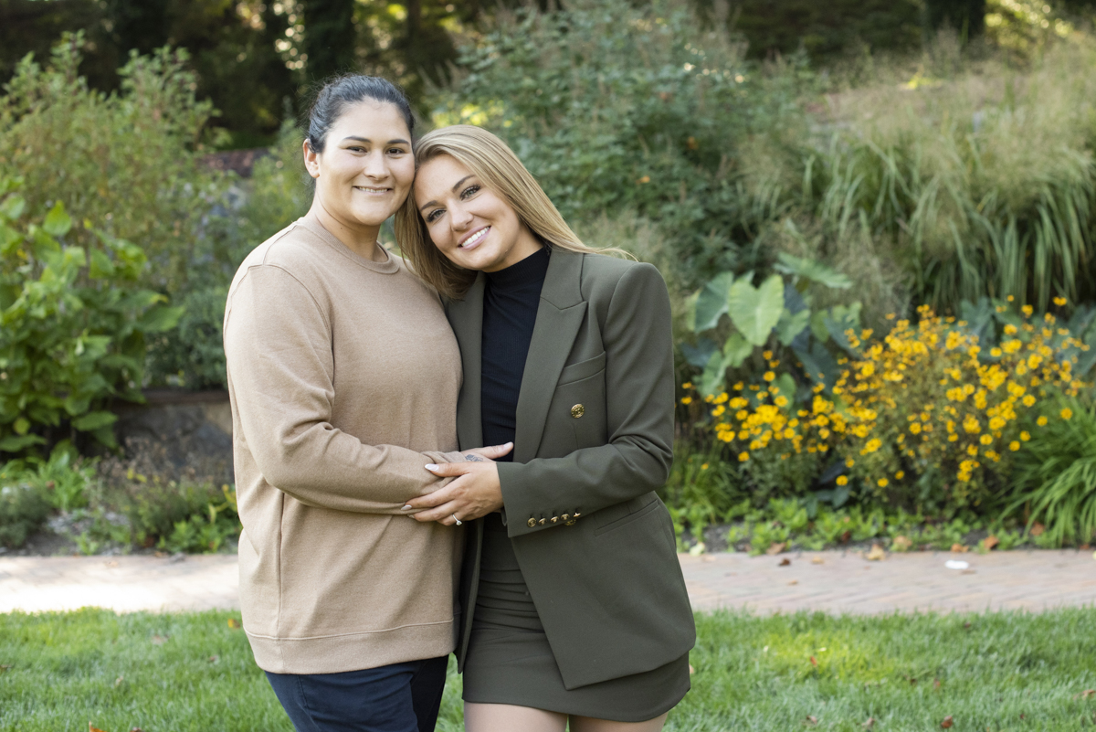 Couple's portrait after Biltmore Estate proposal with Couple walking after proposal with Asheville LGBTQ engagement photographer