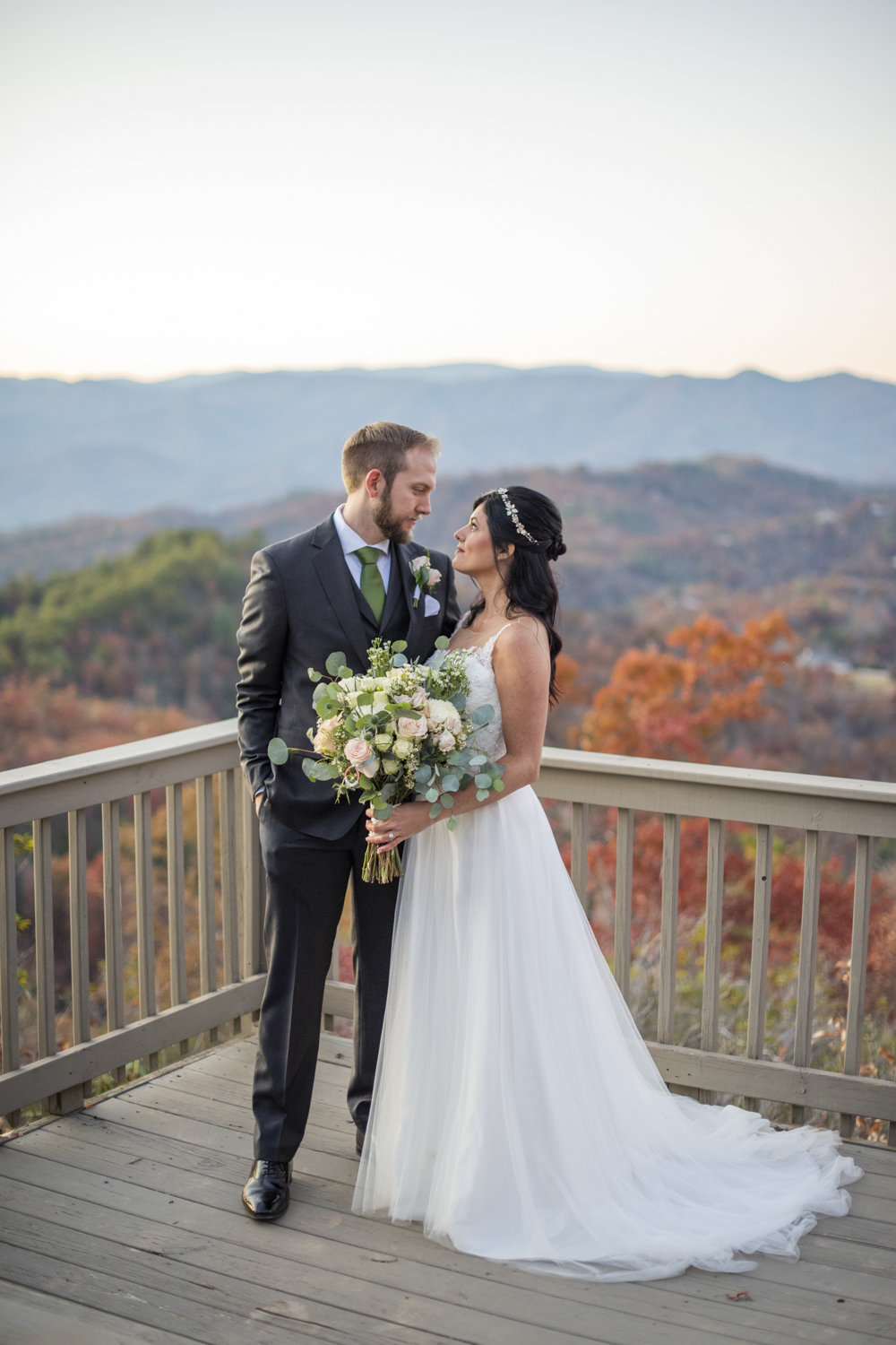 Couple looking at each other at Hawkesdene Fall Wedding Photography