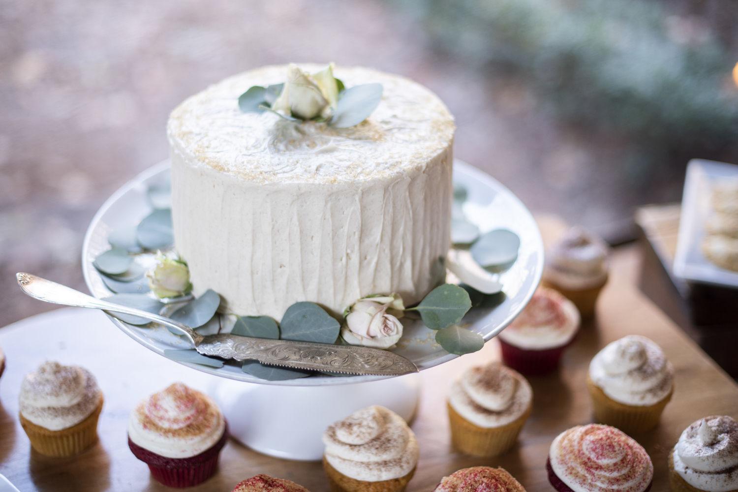 White, pink, greenery wedding cake