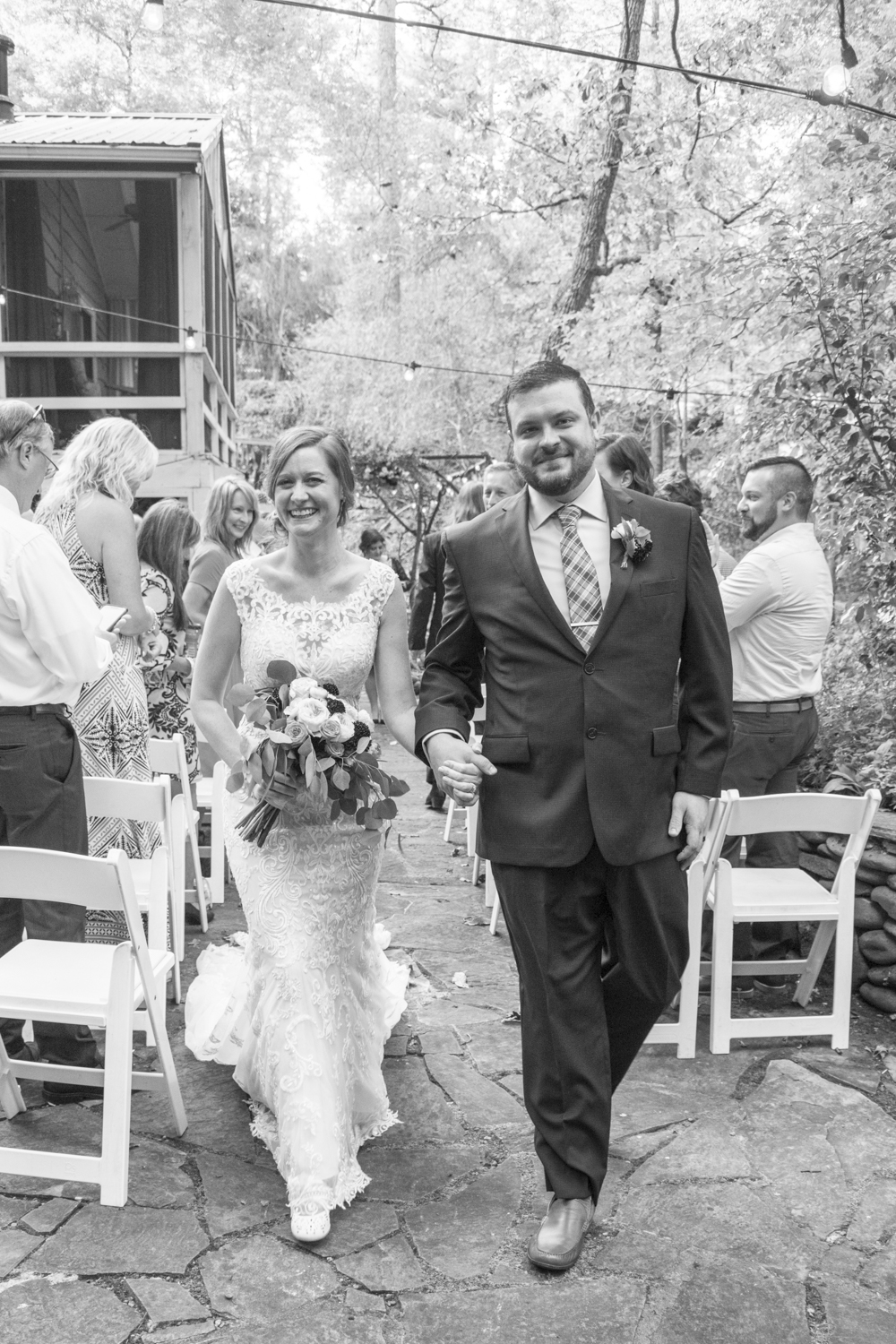 Couple recessing during Willow Falls Wedding Photography