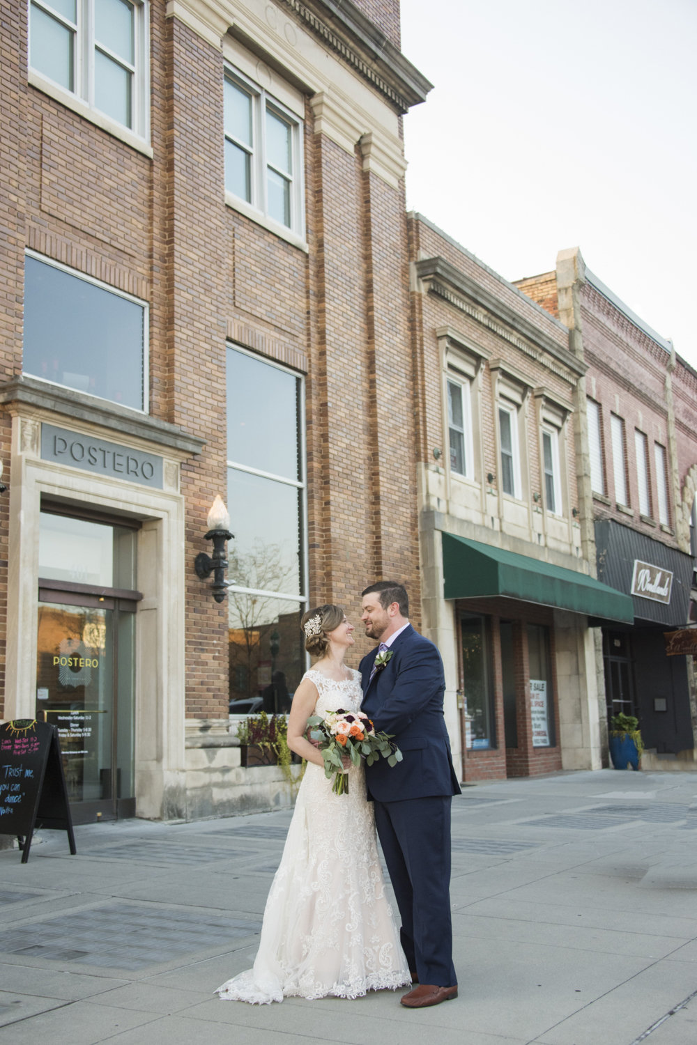 Couple on Main Street in Hendersonville NC wedding photos