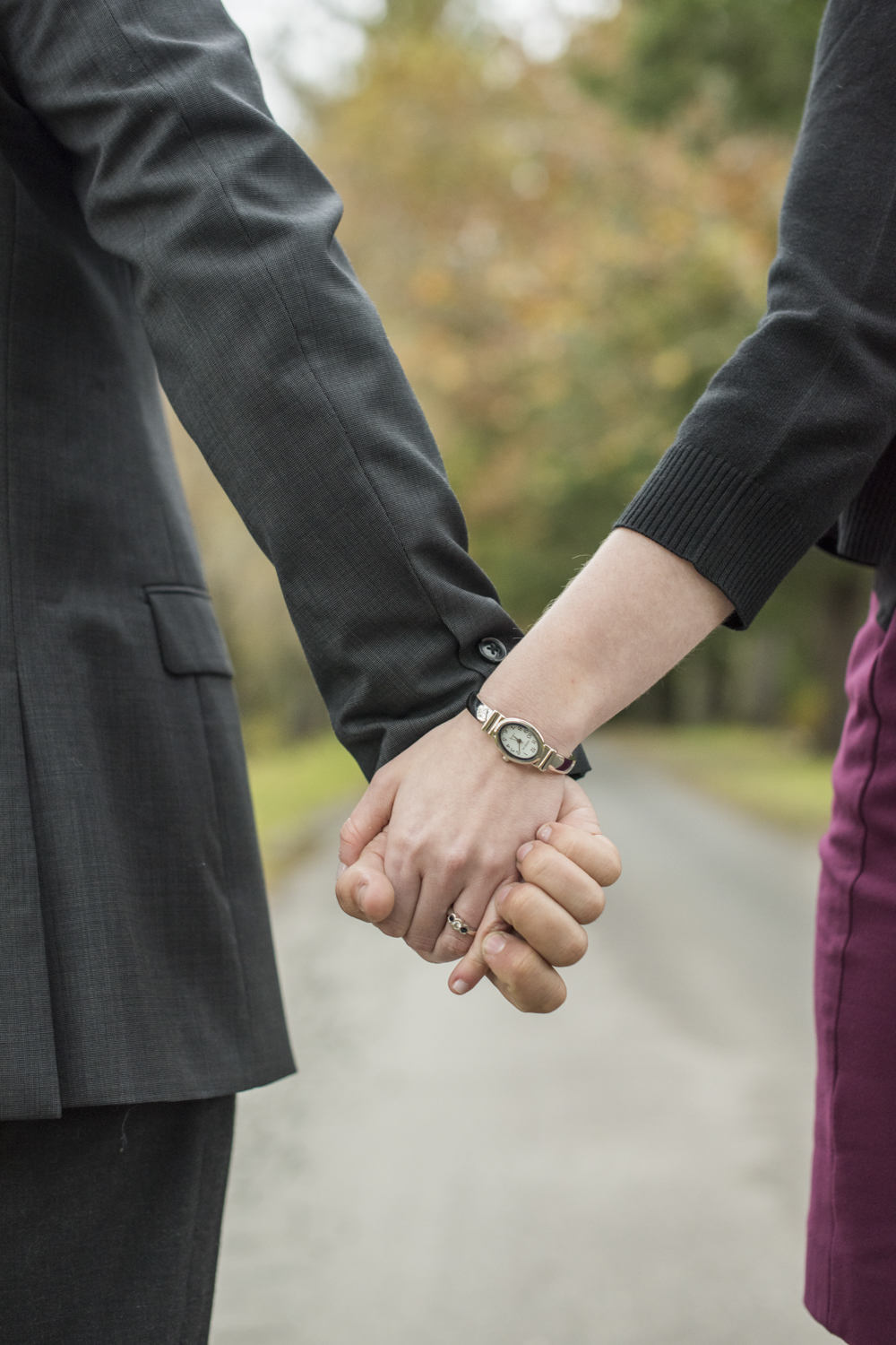 Couple holding hands at Engagement Photo Locations in Asheville