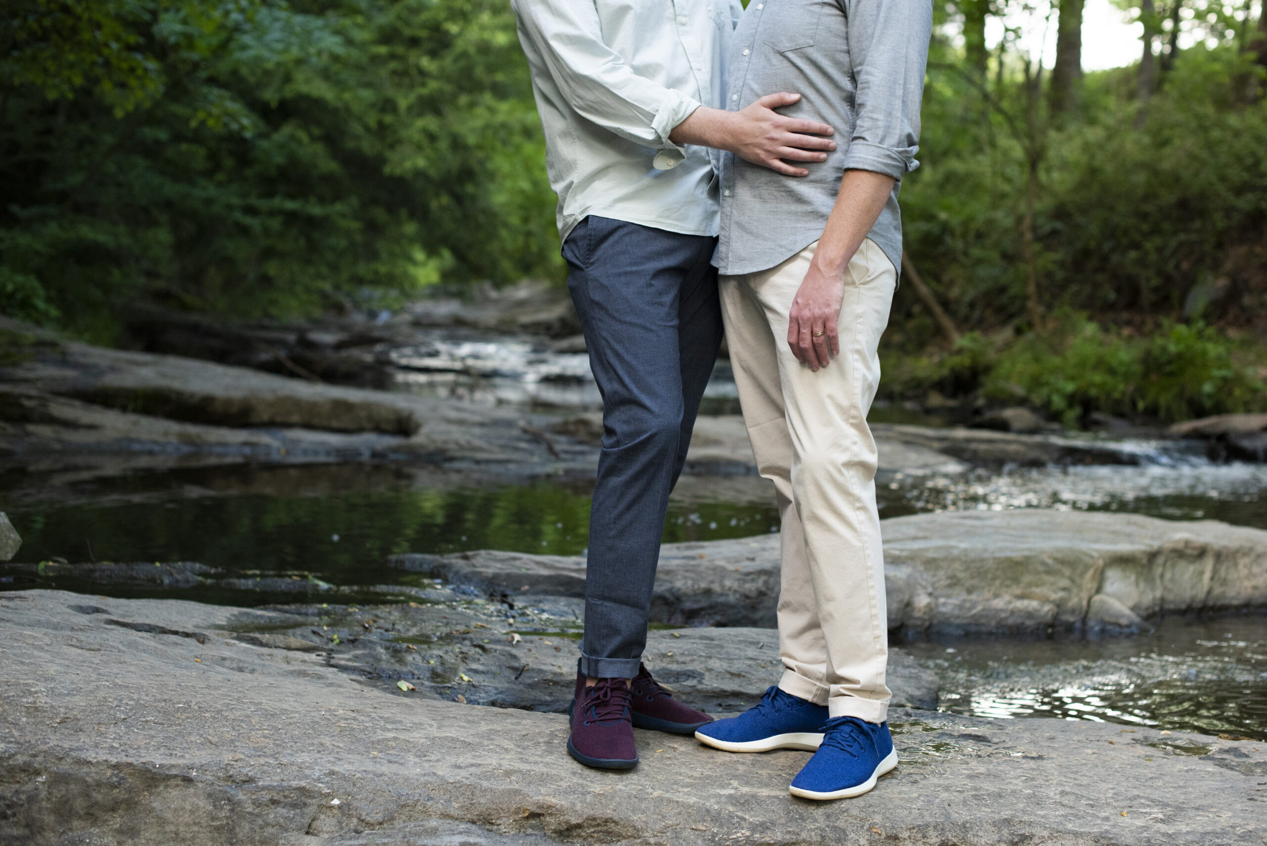 Couple standing at creek at Asheville Engagement Photography at the Botanical Gardens