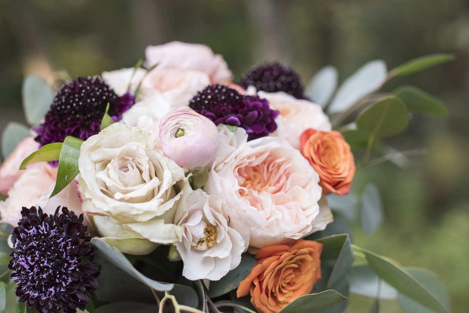 Colorful wedding bouquet with pink roses