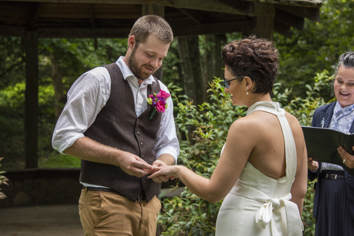 Ring ceremony at Asheville Botanical Gardens elopement