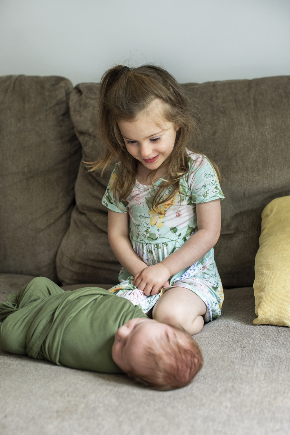 big sister and baby at home Newborn Photography in Asheville