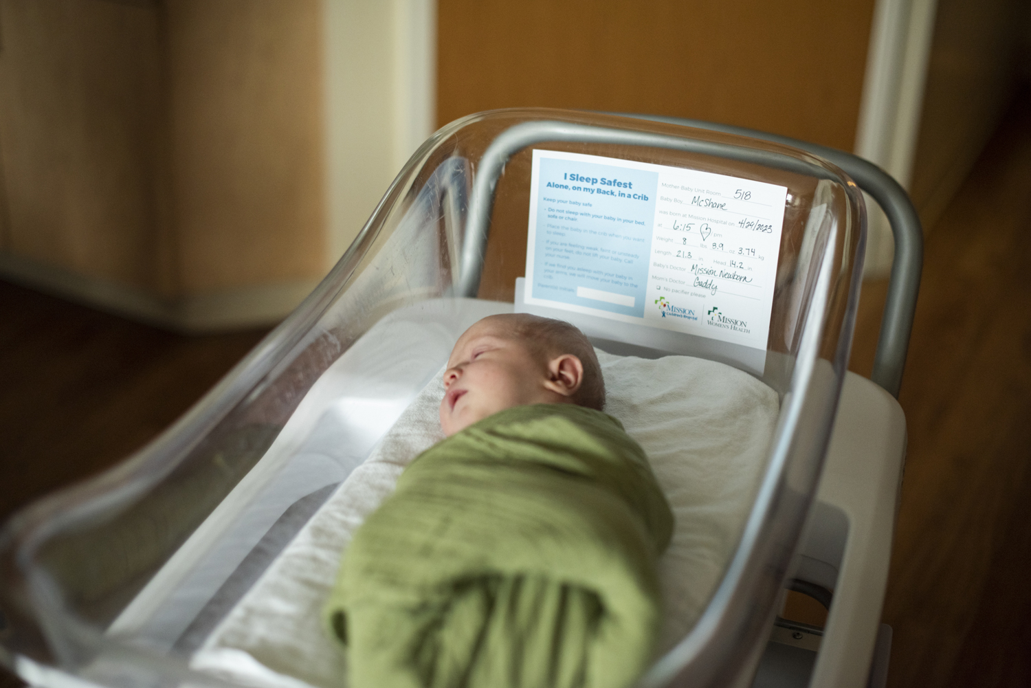 Newborn baby in bassinet Hospital Newborn Photography in Asheville