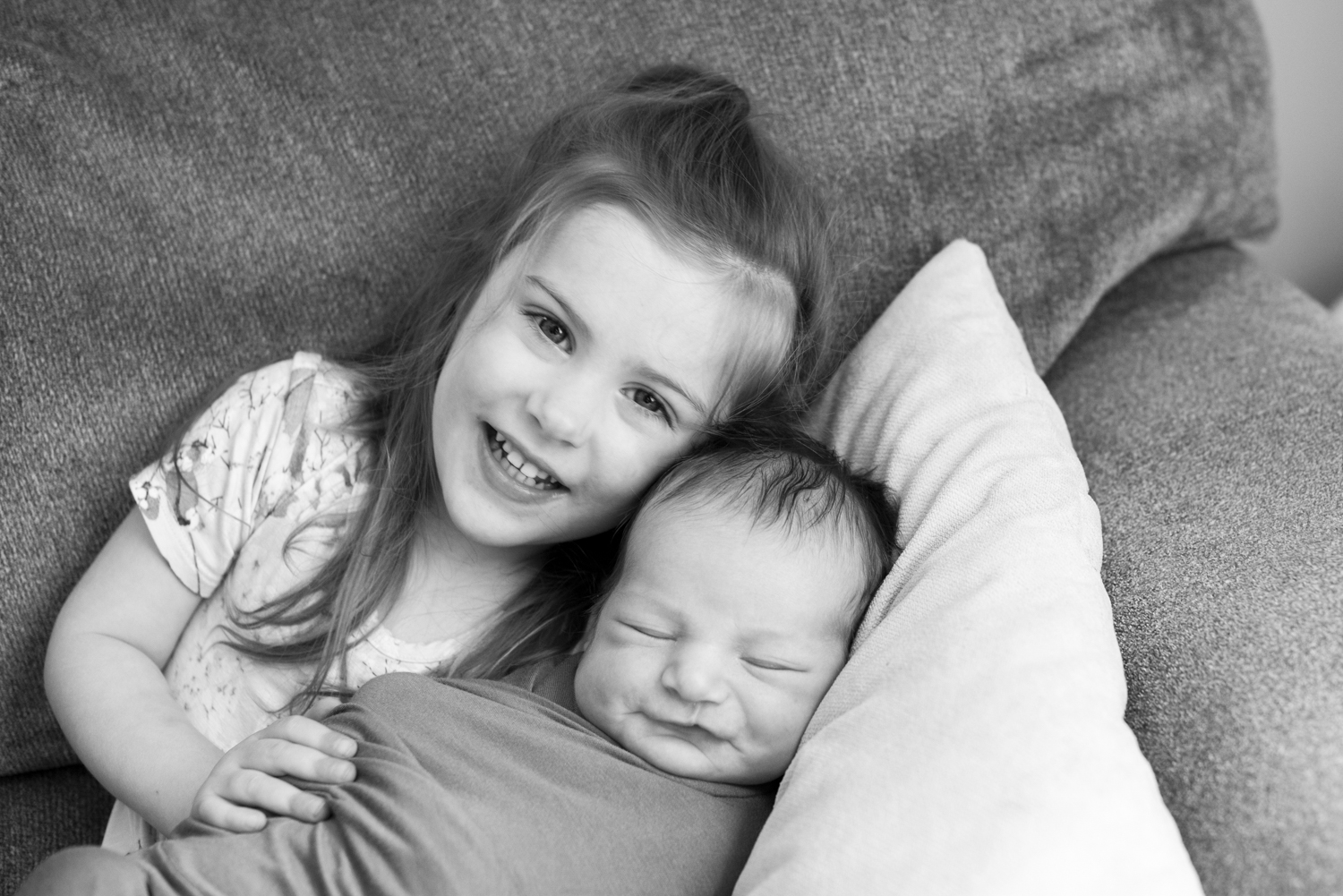 Big sister and newborn baby photo