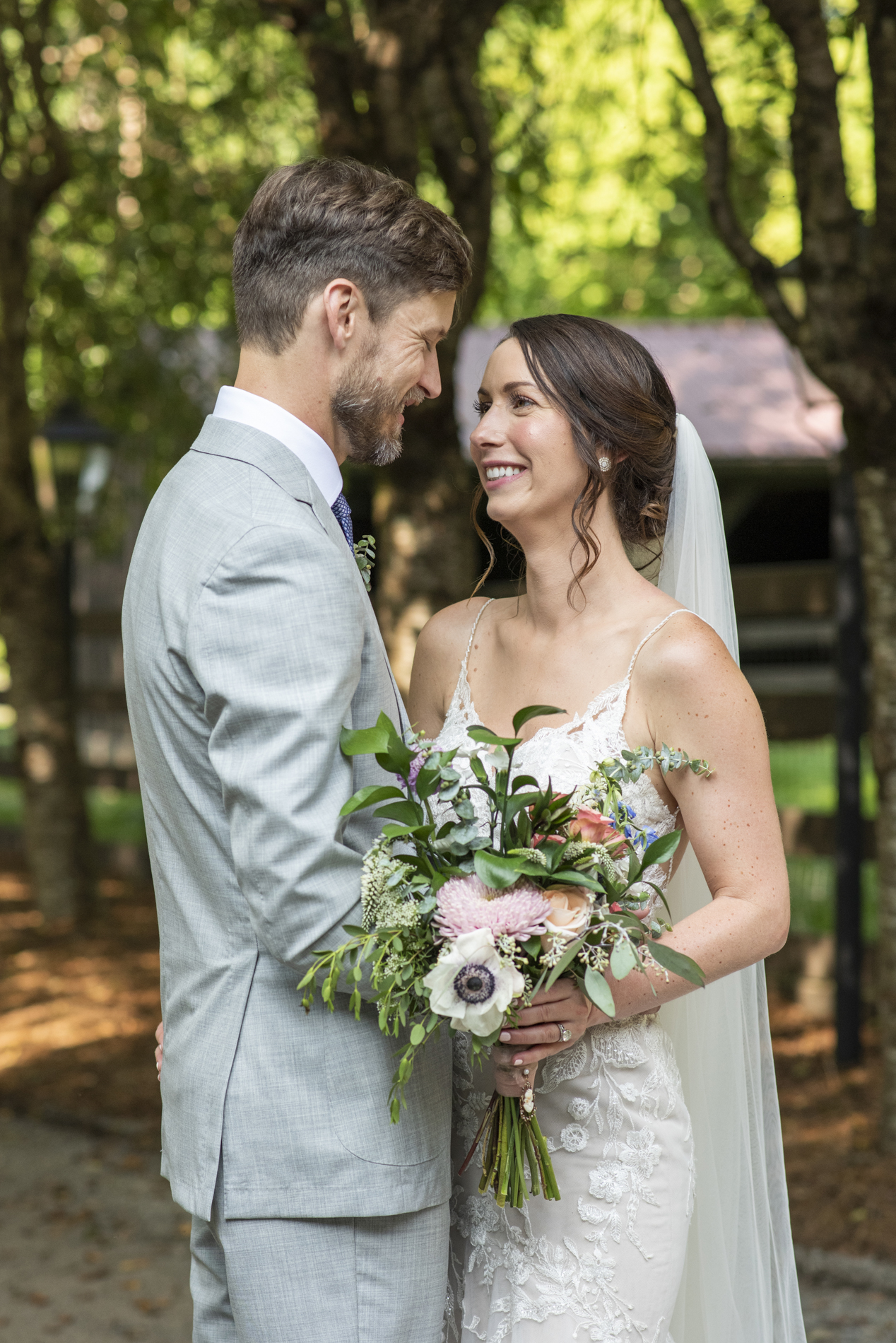 Couple looking at each other at with Hawkesdene Wedding Photographer