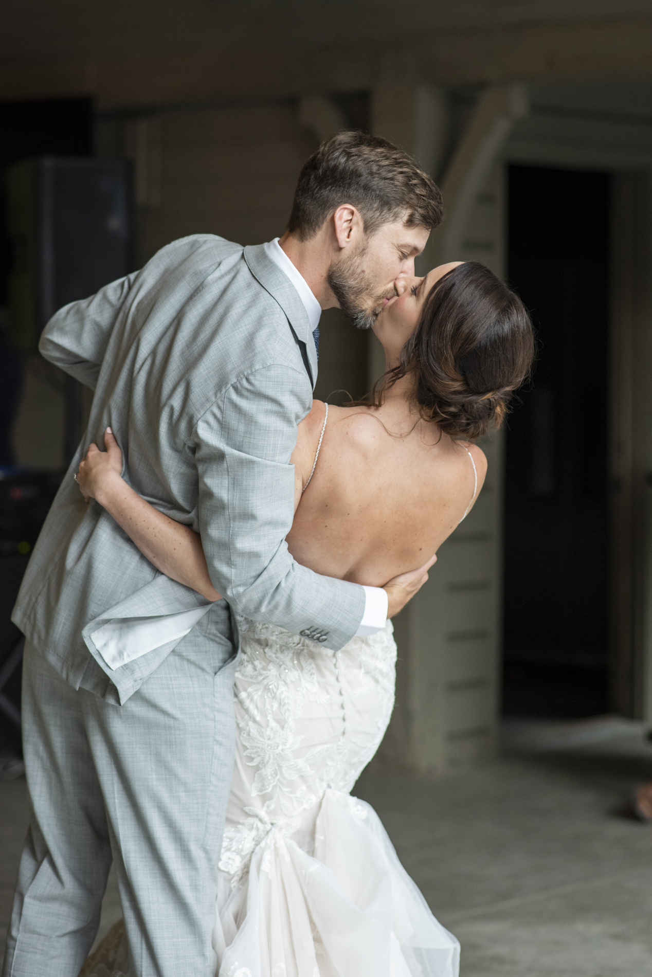 Couple kissing at wedding first dance in Andrews, NC