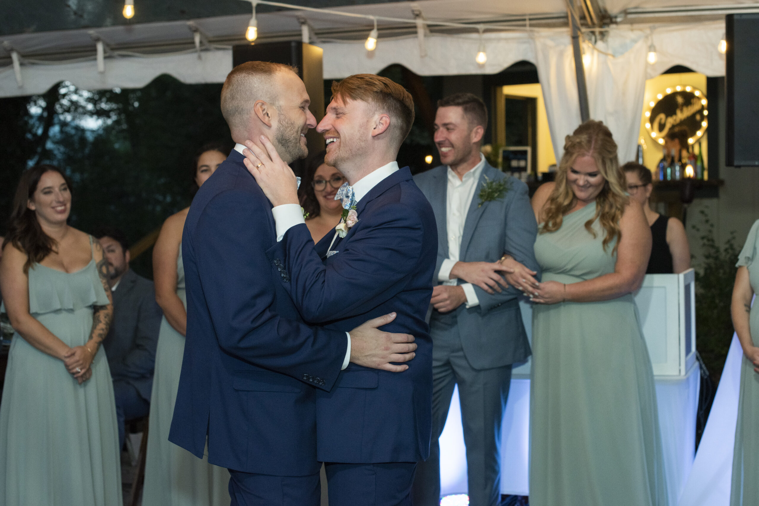 Gay couple dancing at Asheville wedding