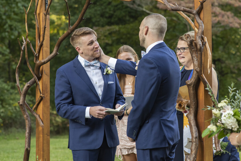 Gay couple during wedding ceremony