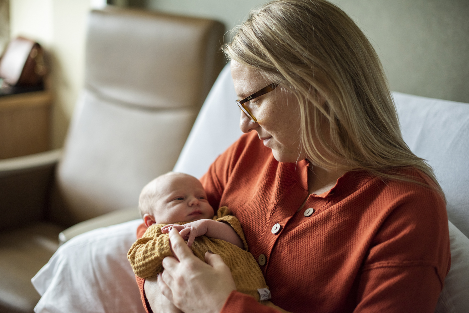 Mom holding baby boy Hospital Newborn Photography in Asheville