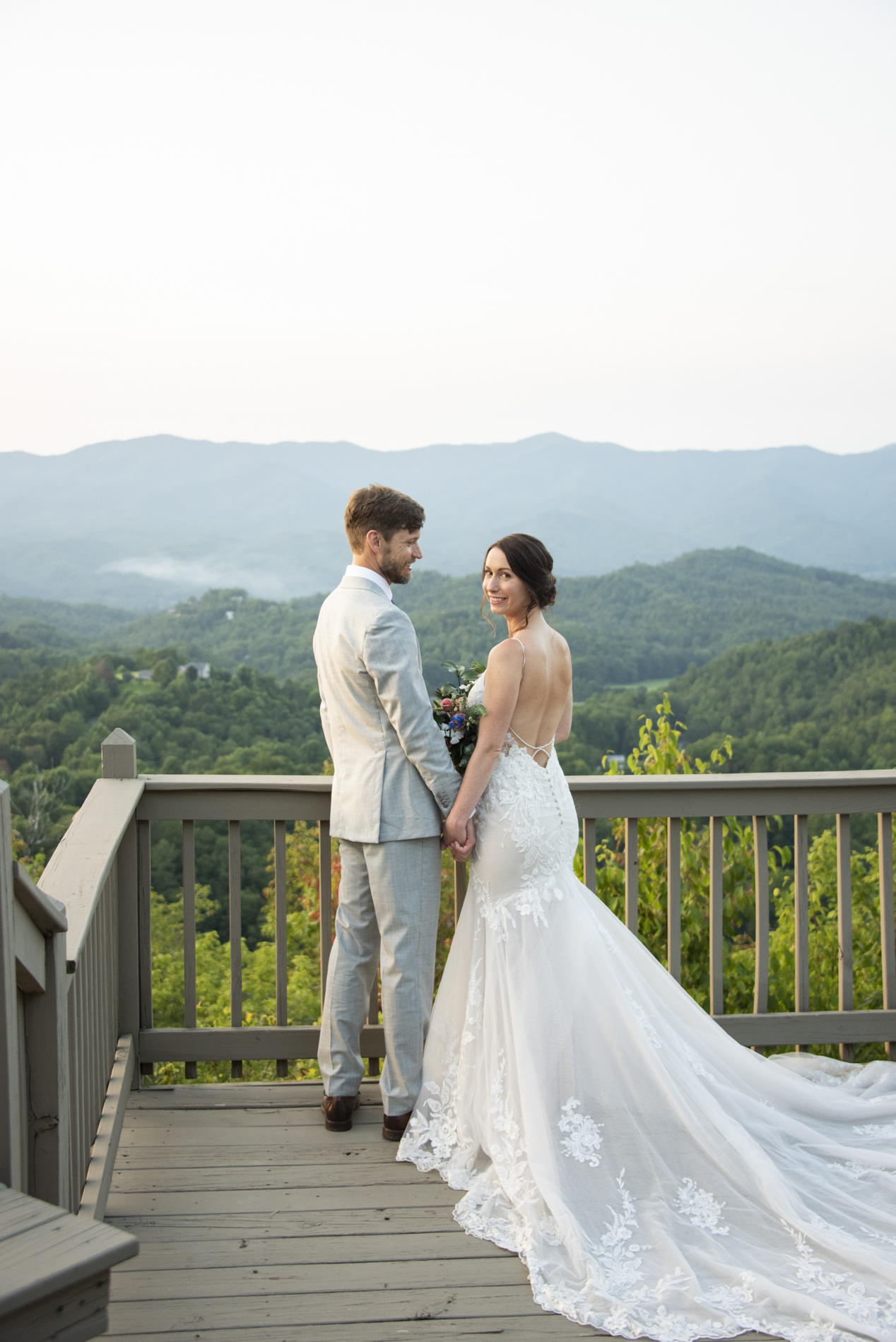 Couple on mountain top with Hawkesdene Wedding Photographer