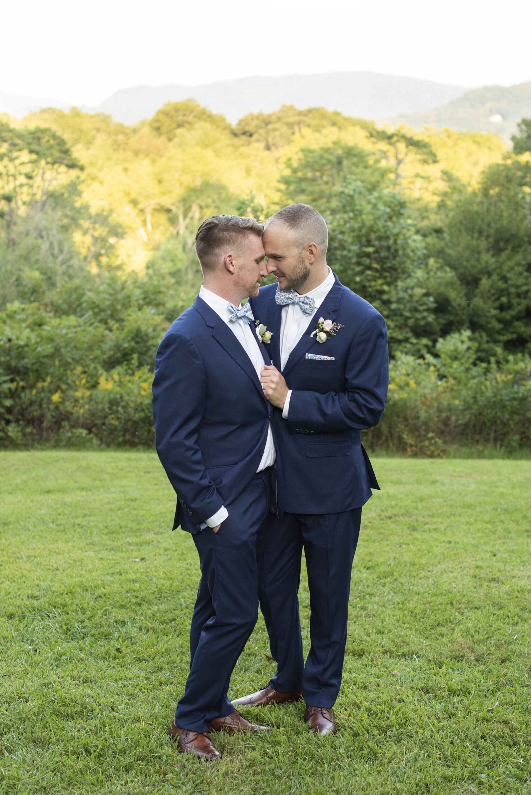 Couple snuggling at Twisty Maple Wedding Photography