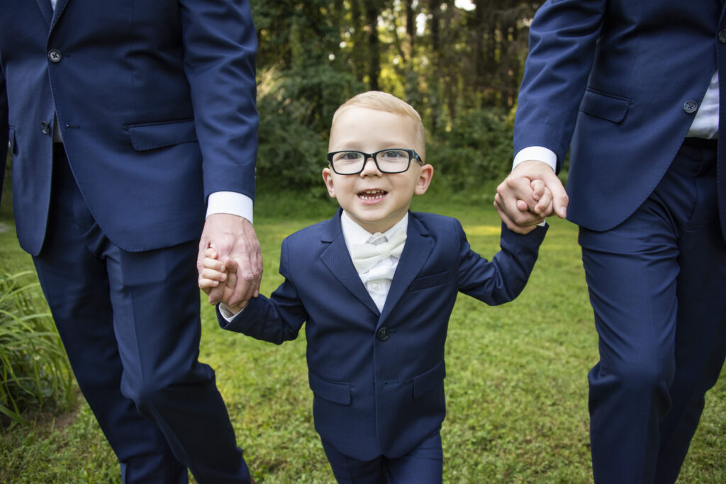 Ring bearer in blue suit at Asheville, NC wedding