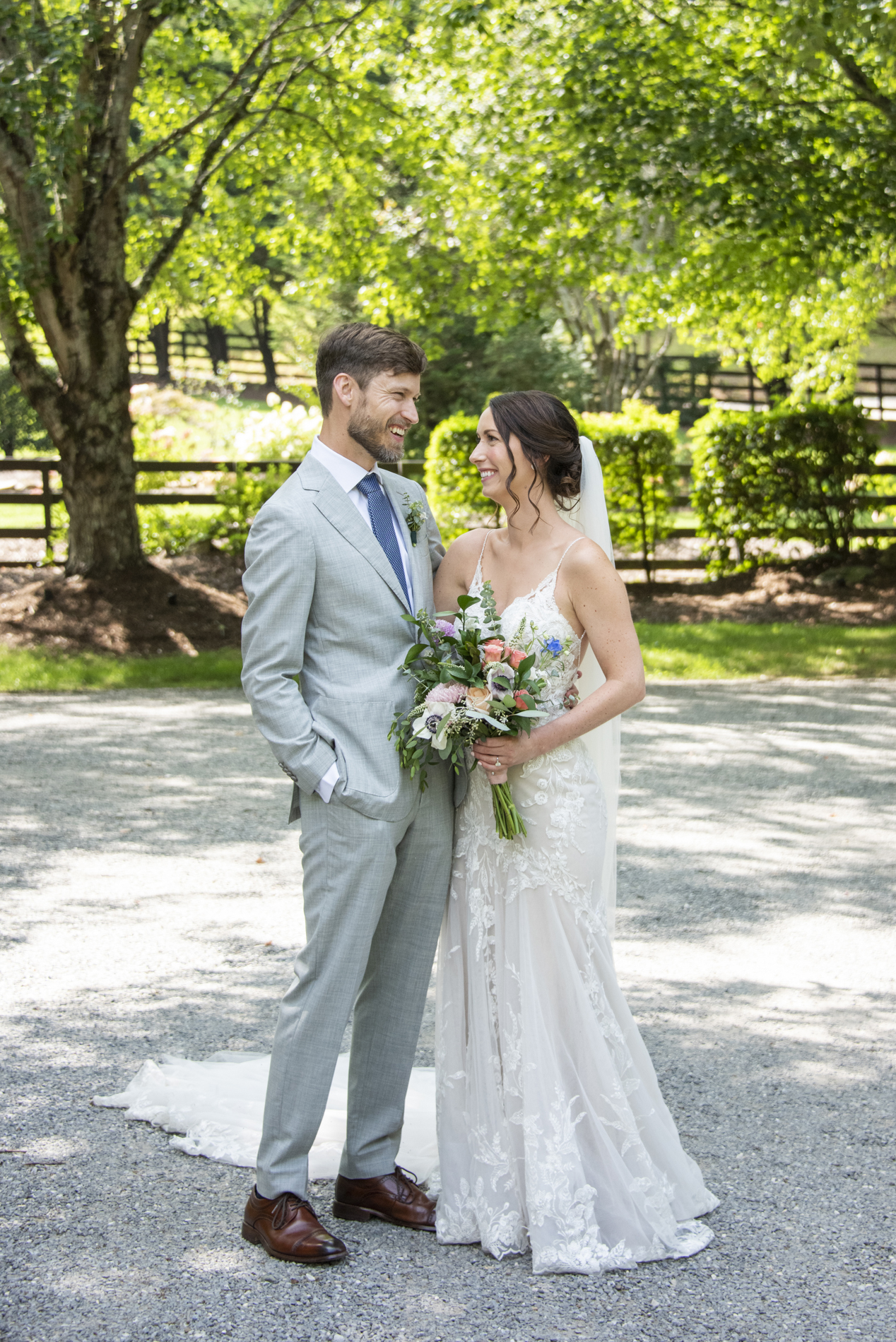 Couple laughing with Hawkesdene Wedding Photographer