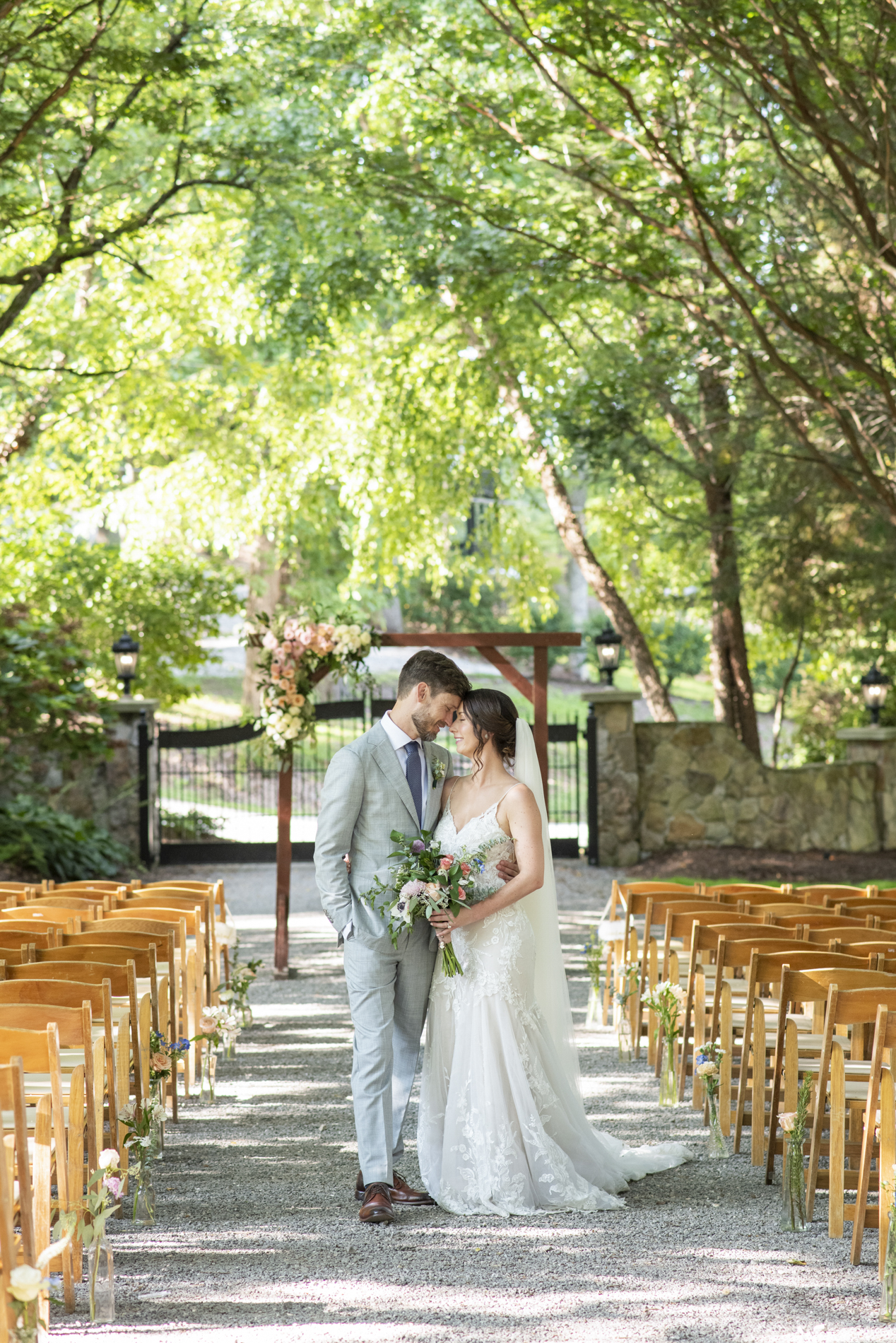 Couple snuggling in Andrews, NC with Hawkesdene Wedding Photographer