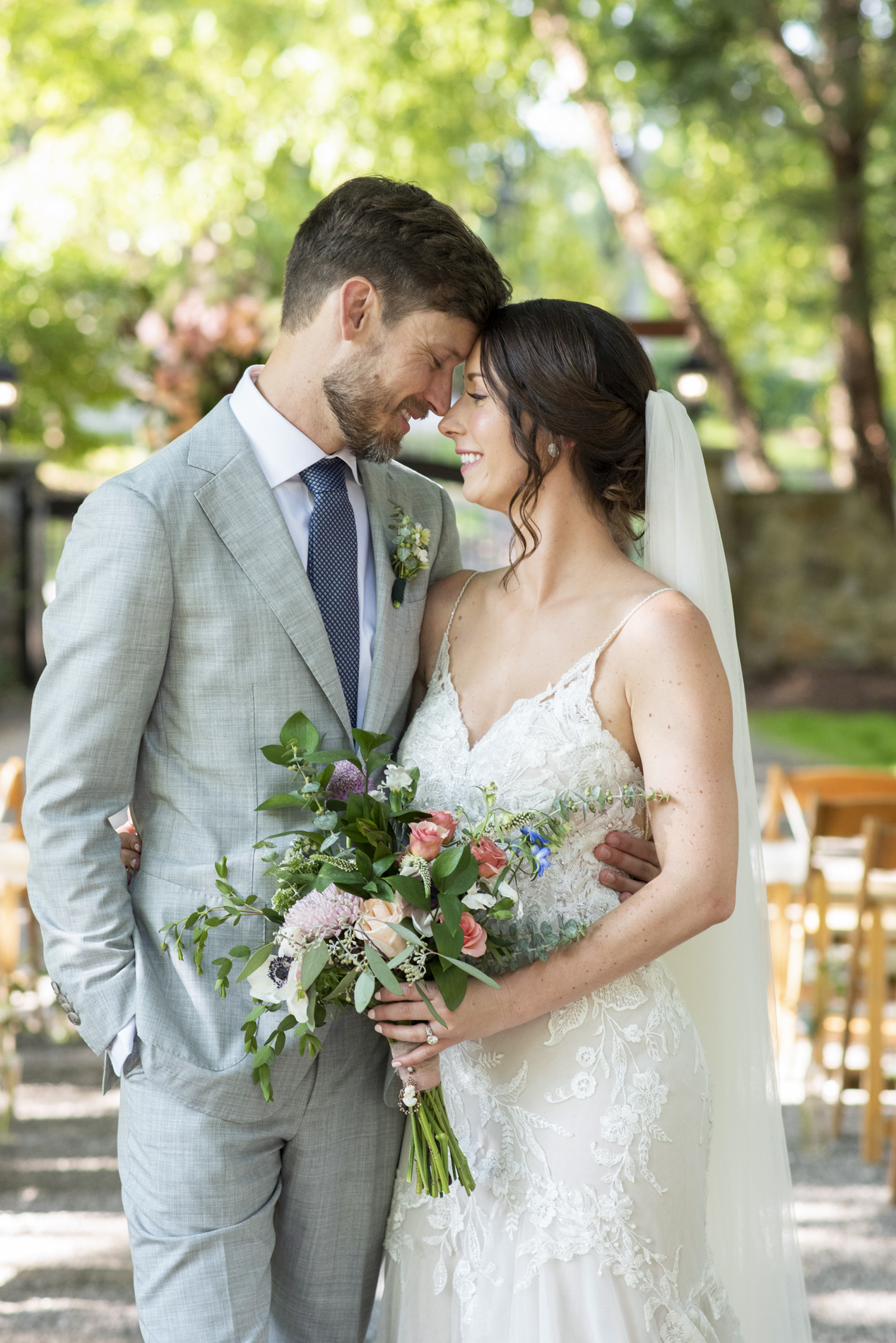 Couple touching foreheads with Hawkesdene Wedding Photographer