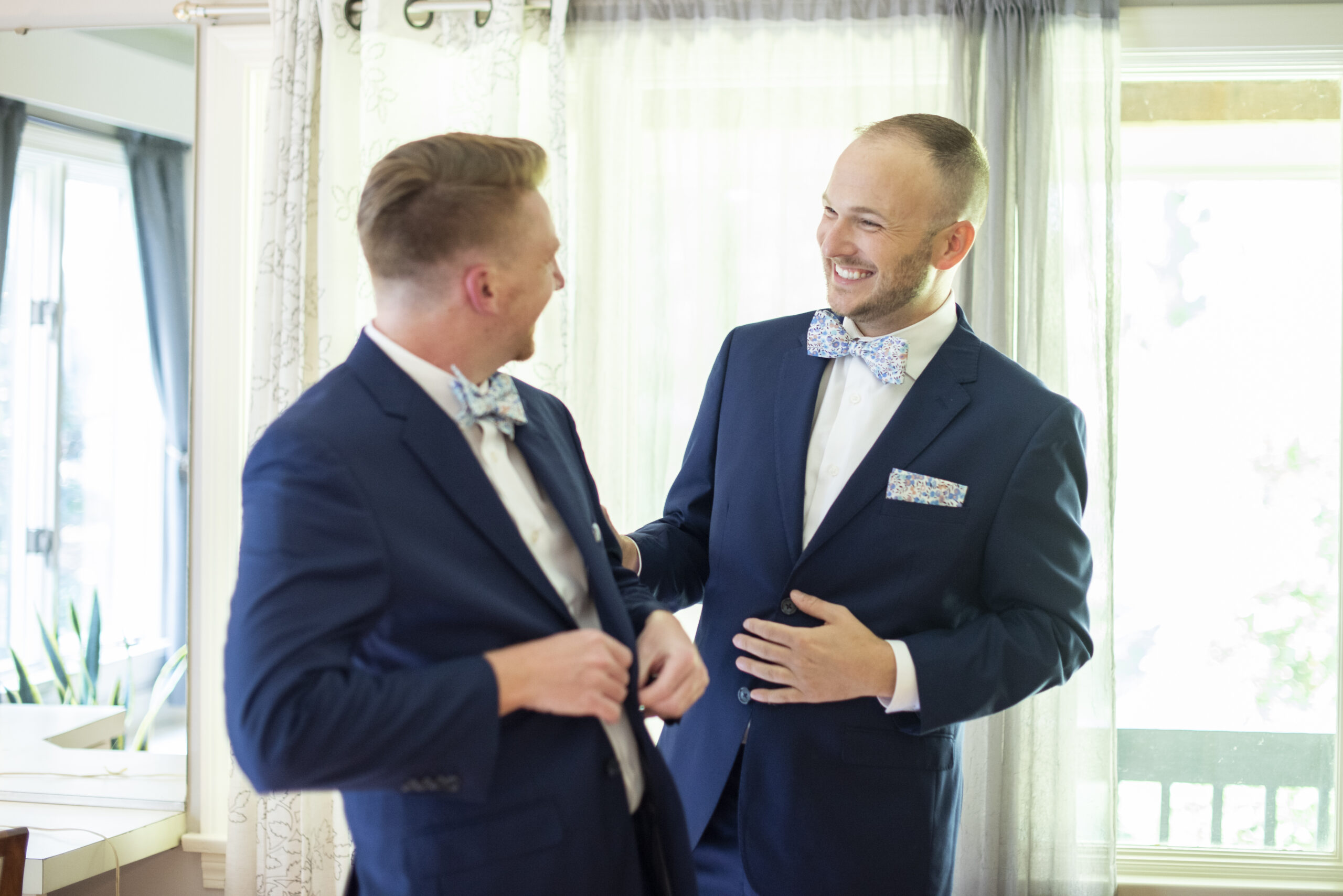 Gay couple getting ready for wedding in Asheville
