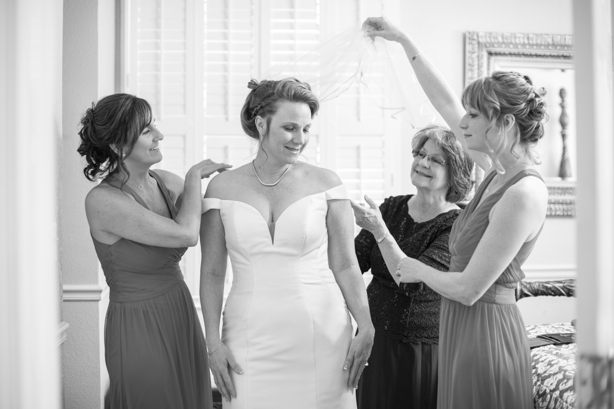 Bride getting ready with bridesmaids and mother at The 1927 Lake Lure Inn Wedding