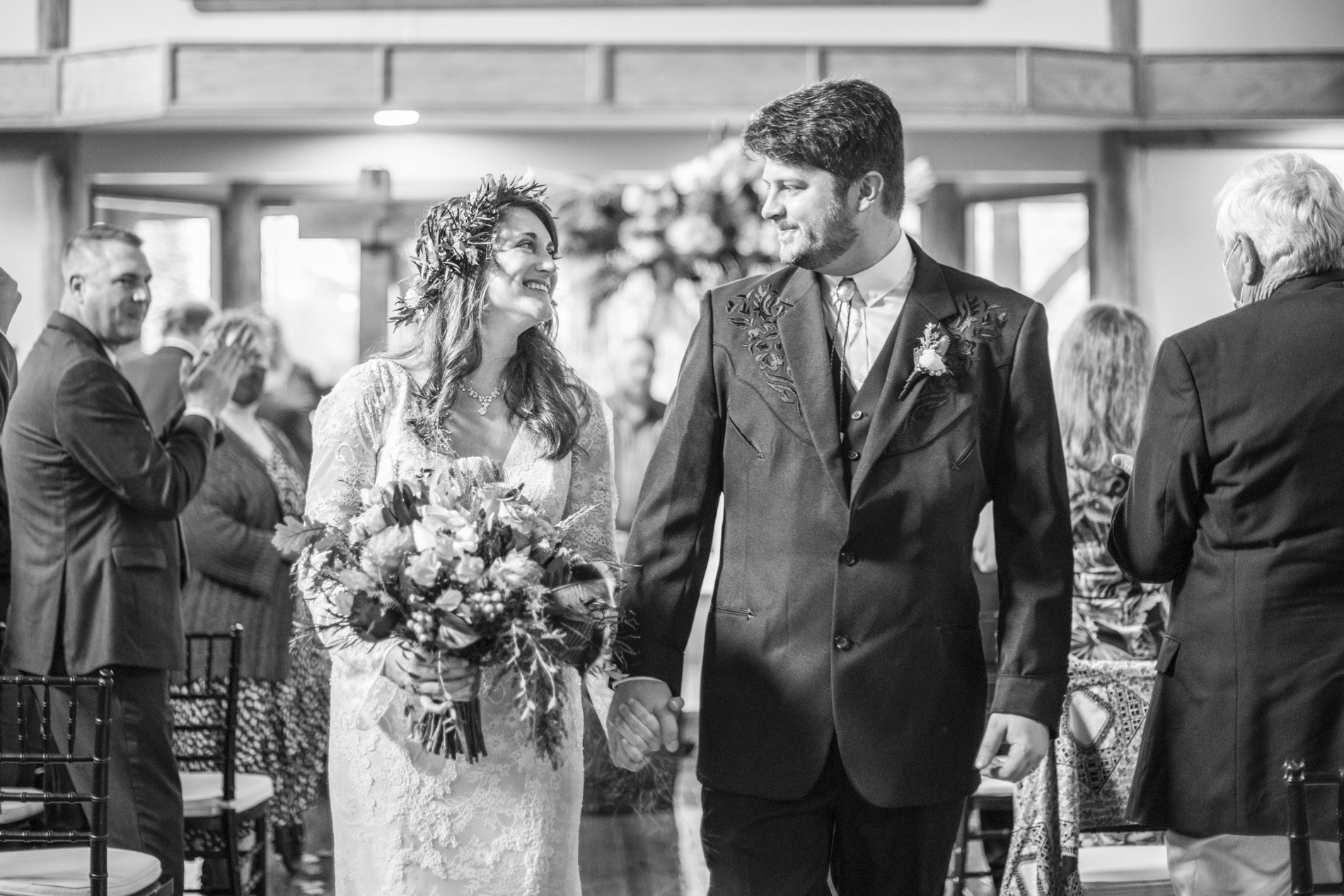 Couple exiting wedding ceremony