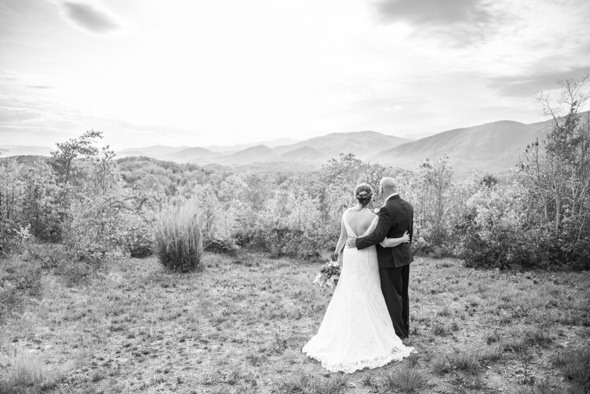 Couple looking out at mountains at Something Blue Mountain Venue