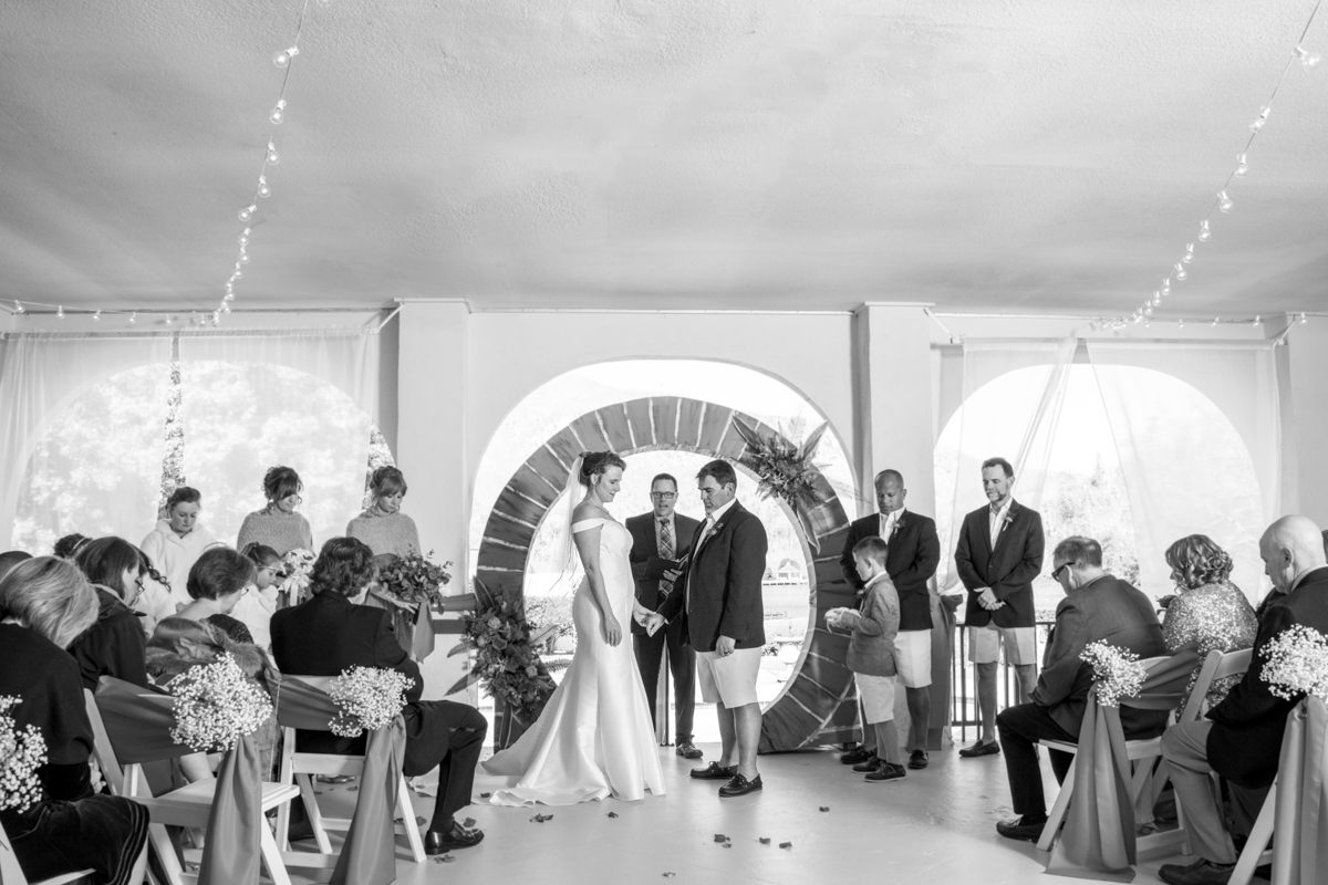 Wedding ceremony outside on veranda at The 1927 Lake Lure Inn Wedding photography