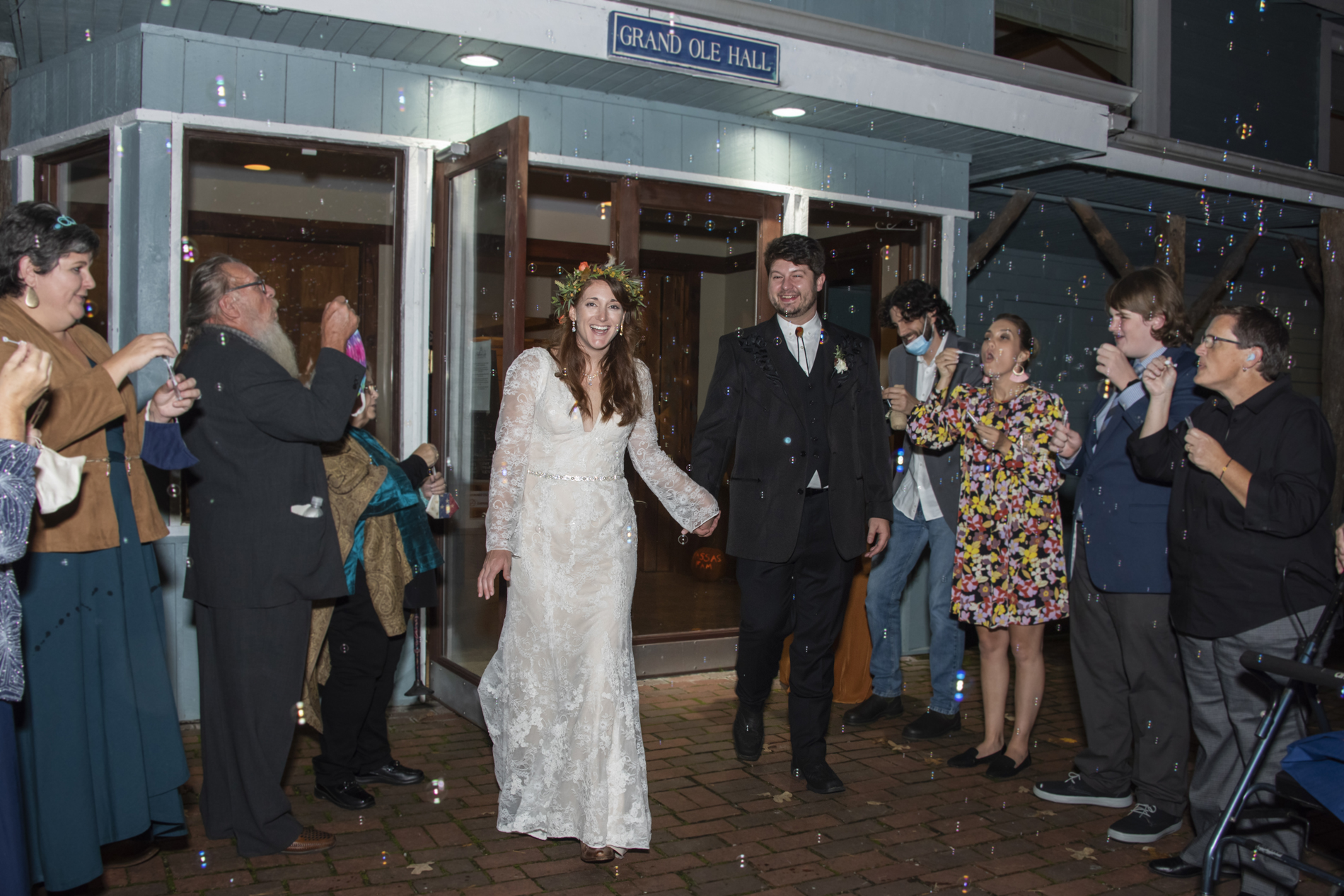 Couple exiting wedding through bubble exit at Highland Lake Inn