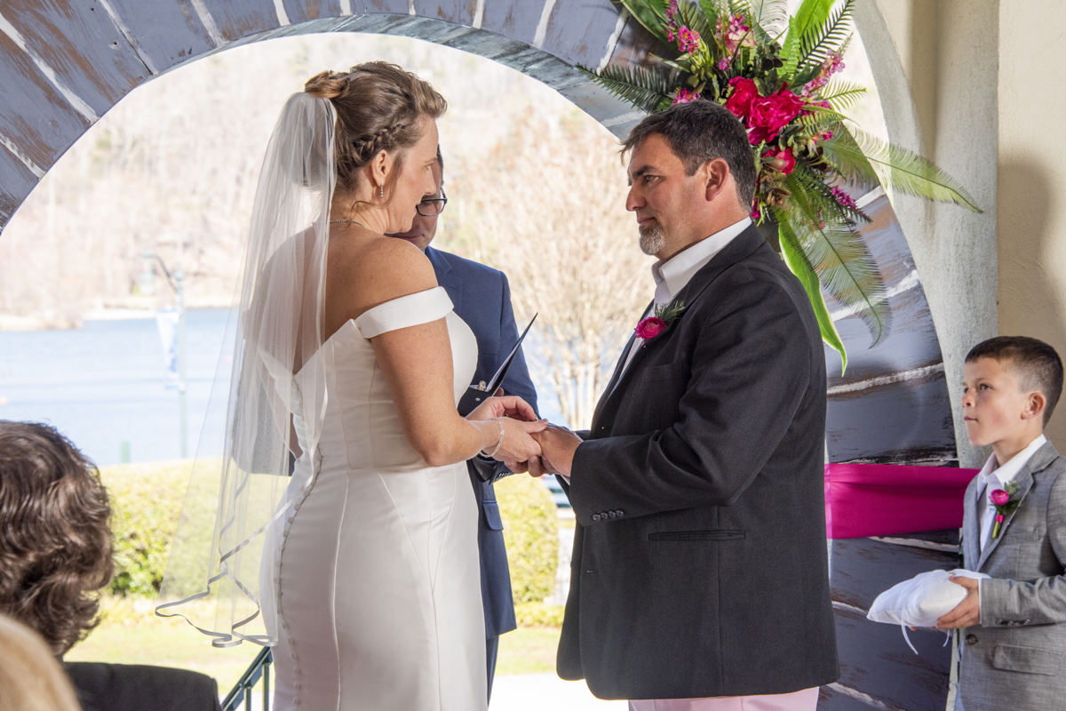 Winter wedding ceremony with lake and mountain views near Asheville, NC