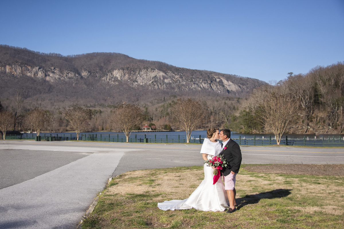 Couple kissing with mountain views at The 1927 Lake Lure Inn Wedding photography